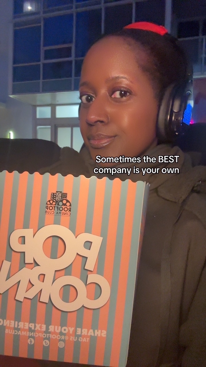 An image of lifestyle blogger Ariel on a solo date at Rooftop Cinema Club.