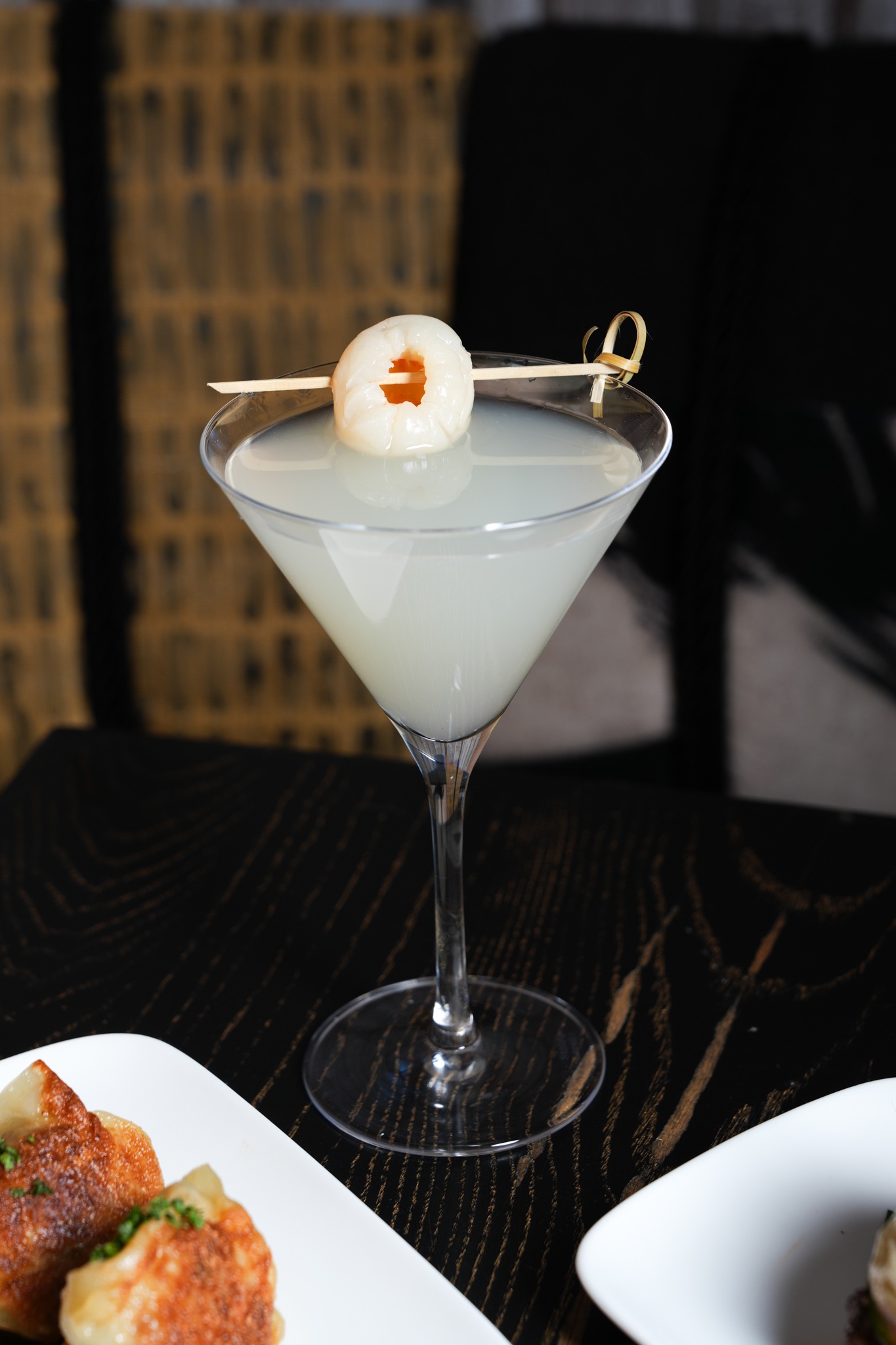 An image of the Lychee & Elderflower Martini from Tanoshi Hour at NoBu Los Angeles.