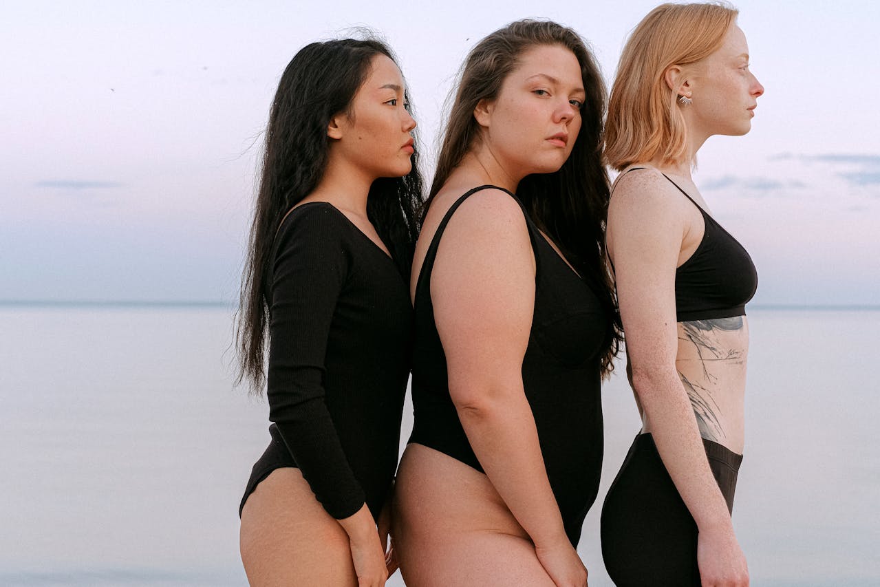 An image of 3 women with 3 different body types.