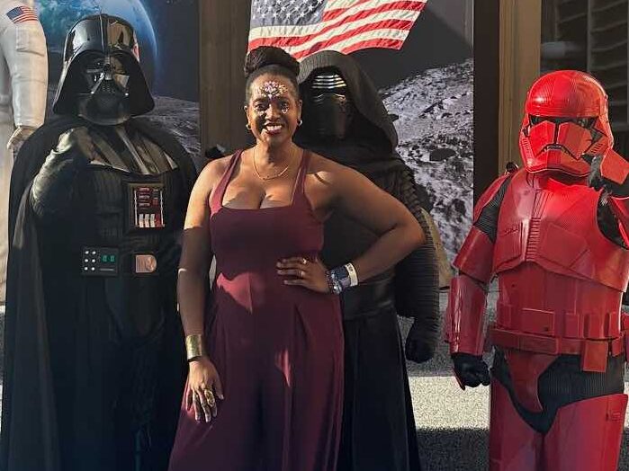An image of lifestyle blogger Ariel with people dressed in Star Wars costumes.
