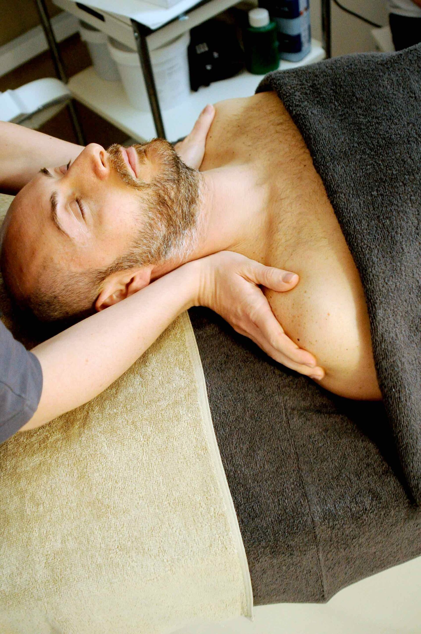 An image of a man getting a massage.