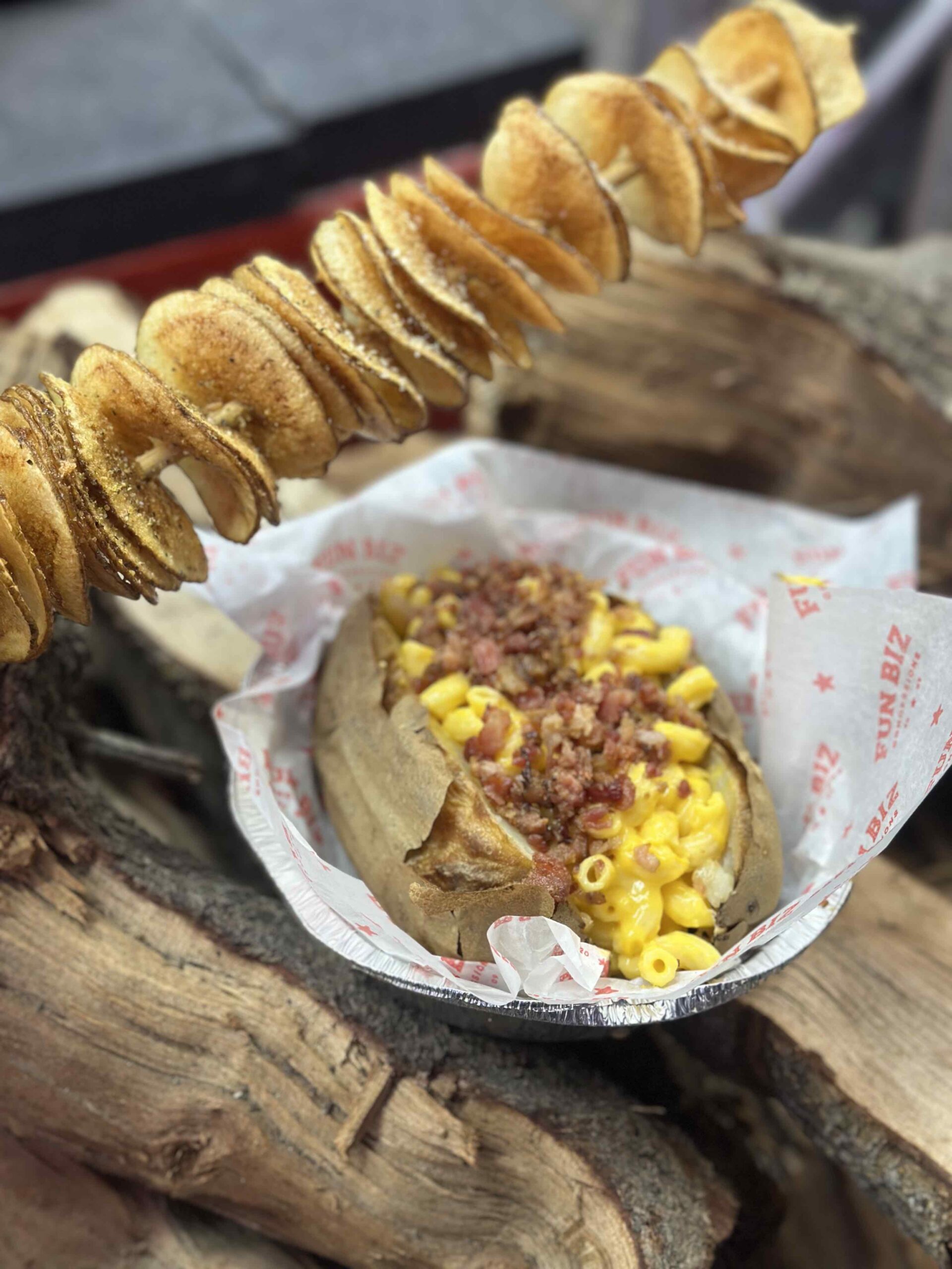 An image of  The Cheese Gringo (mac and cheese and bacon bits on a potato!)