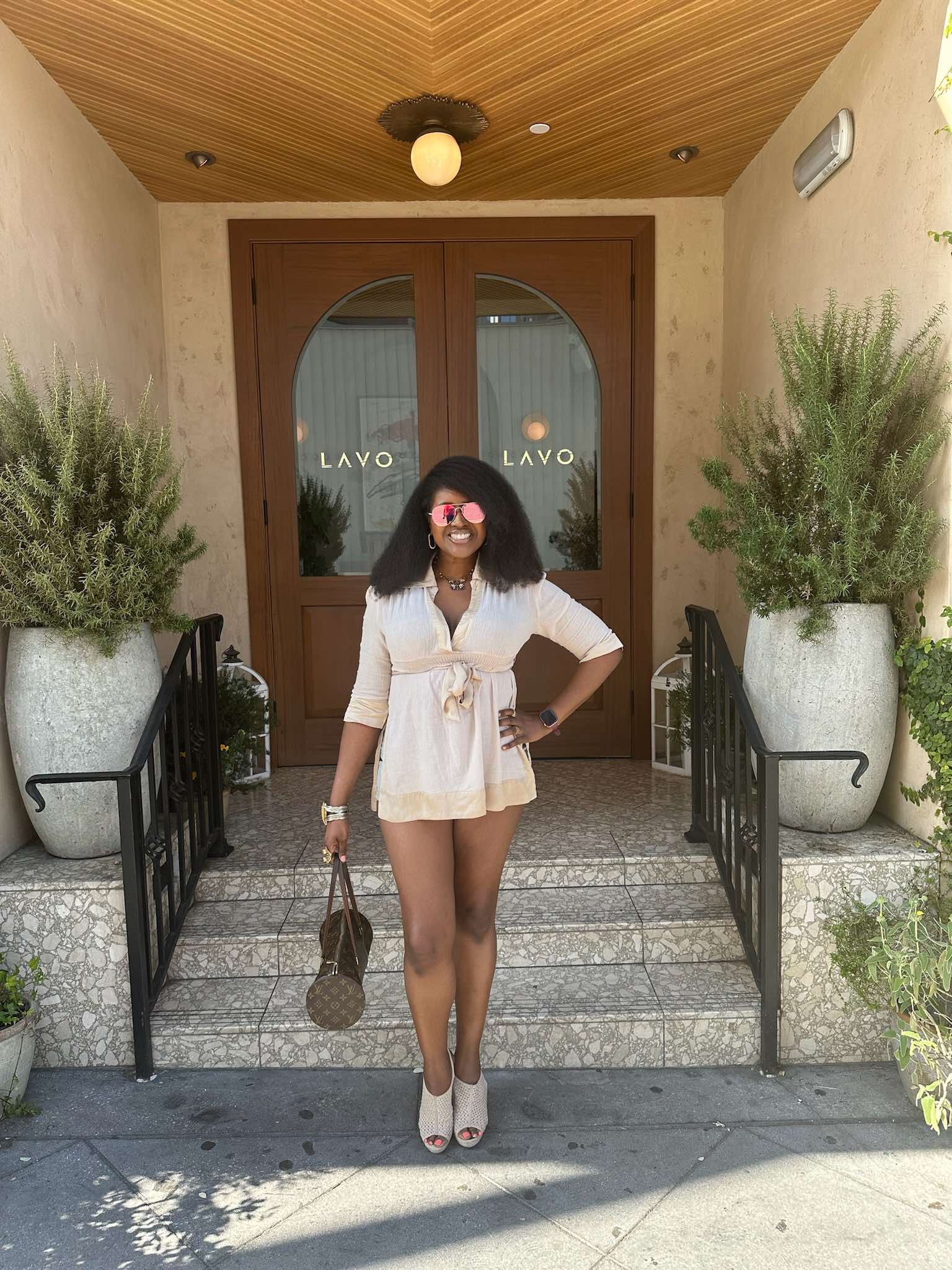 An image of lifestyle blogger Ariel standing outside Lavo.