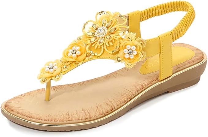An image of Flat Sandals with flowers in butter yellow.
