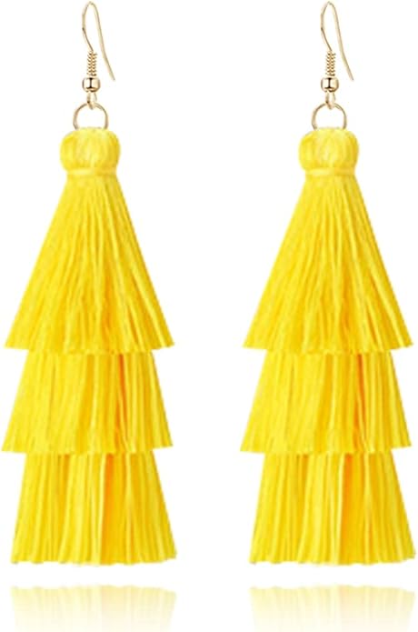 An image of butter yellow tassel earrings.