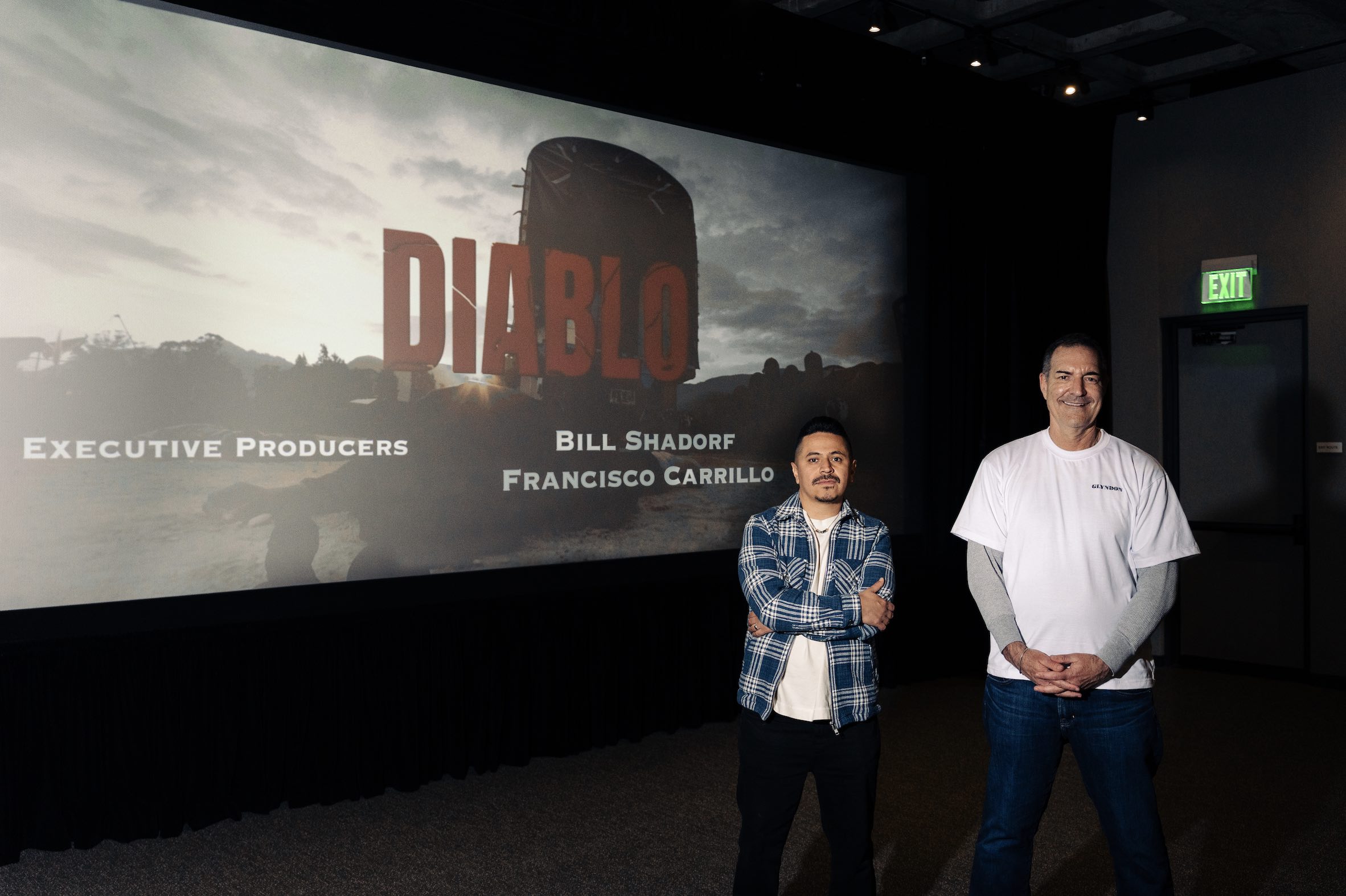 An image of Scott Adkins and Marko Zaror in front of the Diablo movie.
