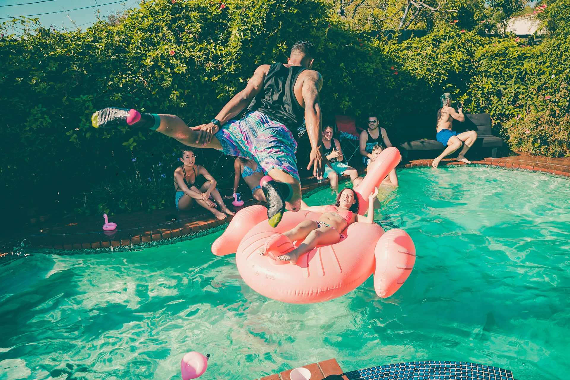An image of people at a pool party.