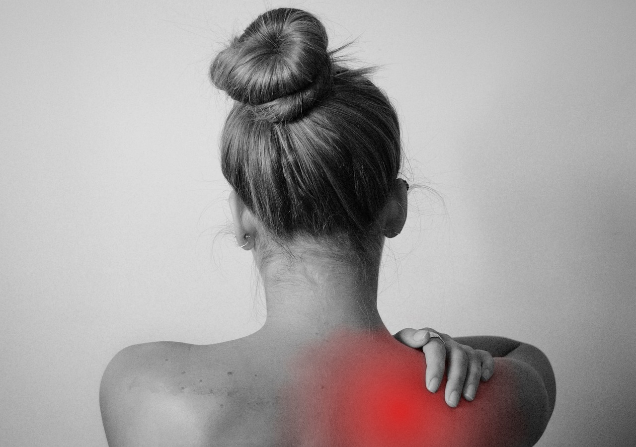 An image of a woman with back pain.