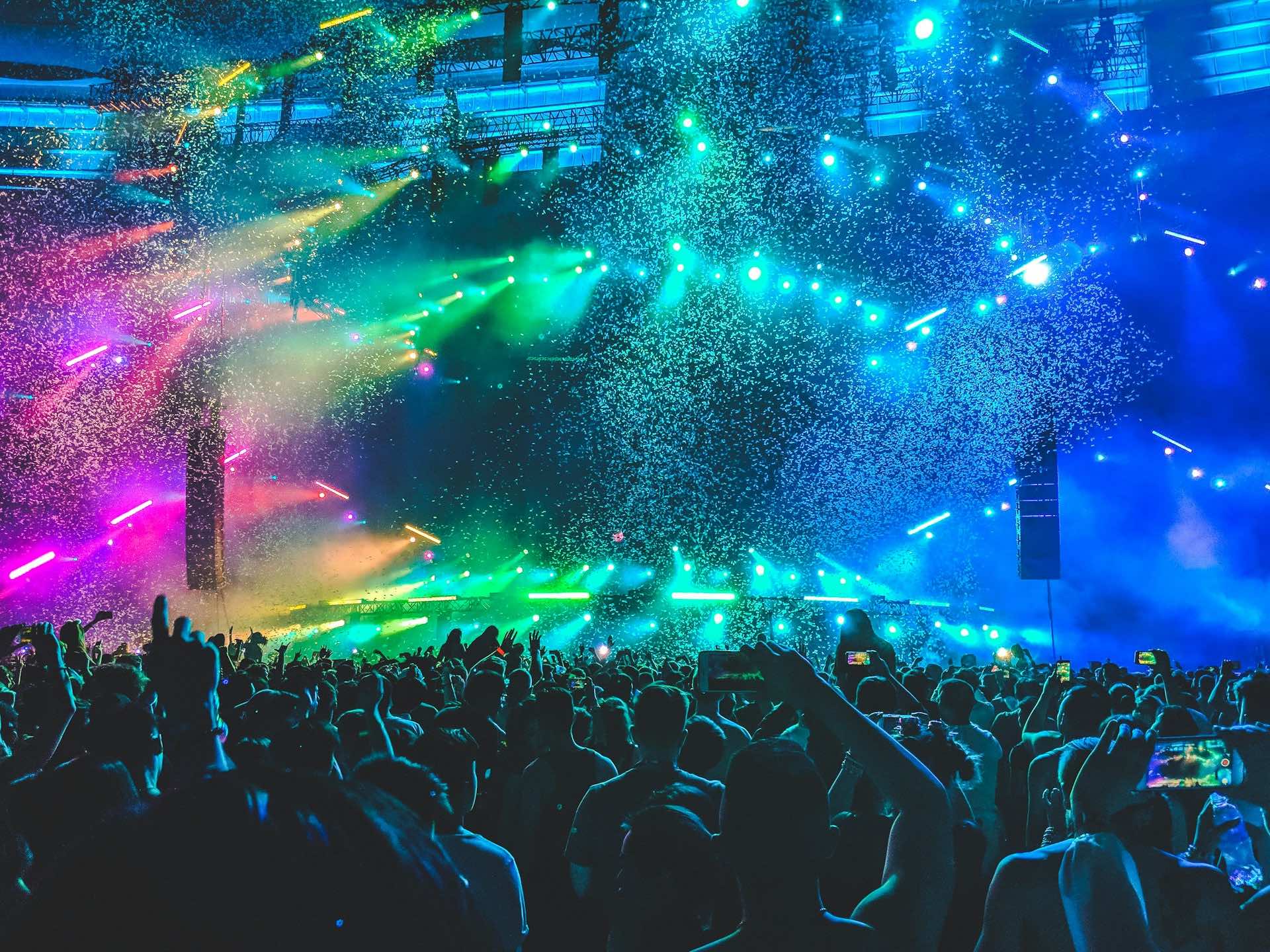 An image of a concert and the fans.