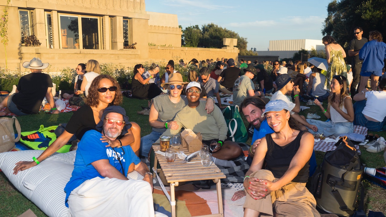 An image of a group of friends at Barnsdall Art Park's beloved Wine Tasting series.