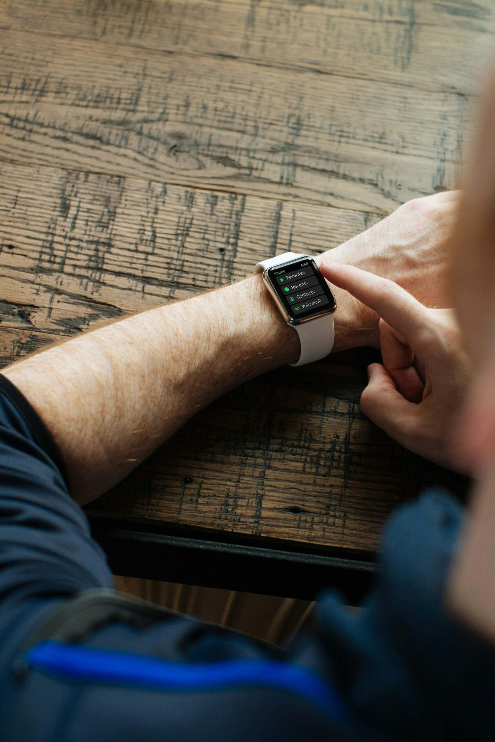 An image of a man wearing a smart watch.