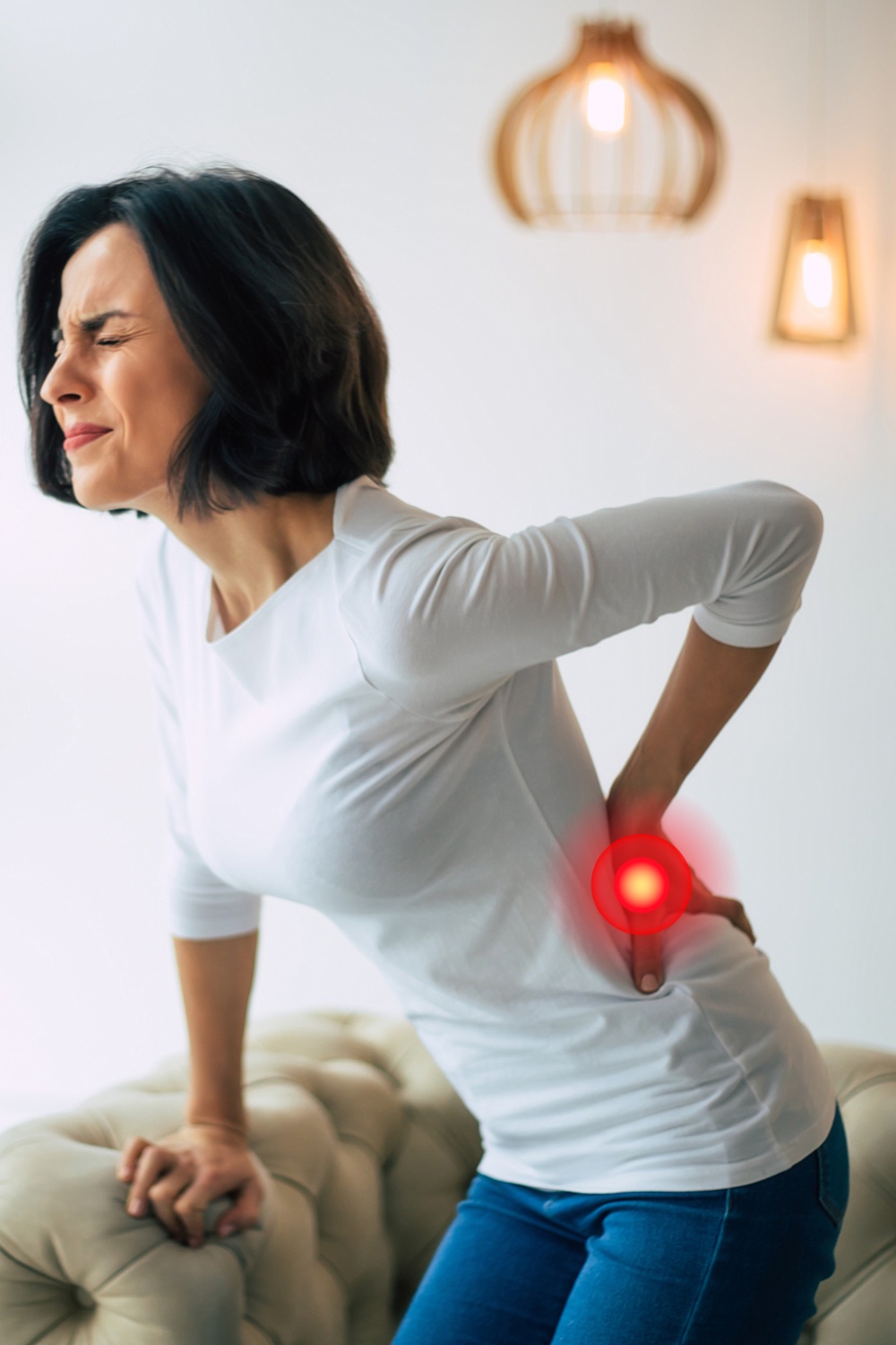 An image of a woman with lower back pain.