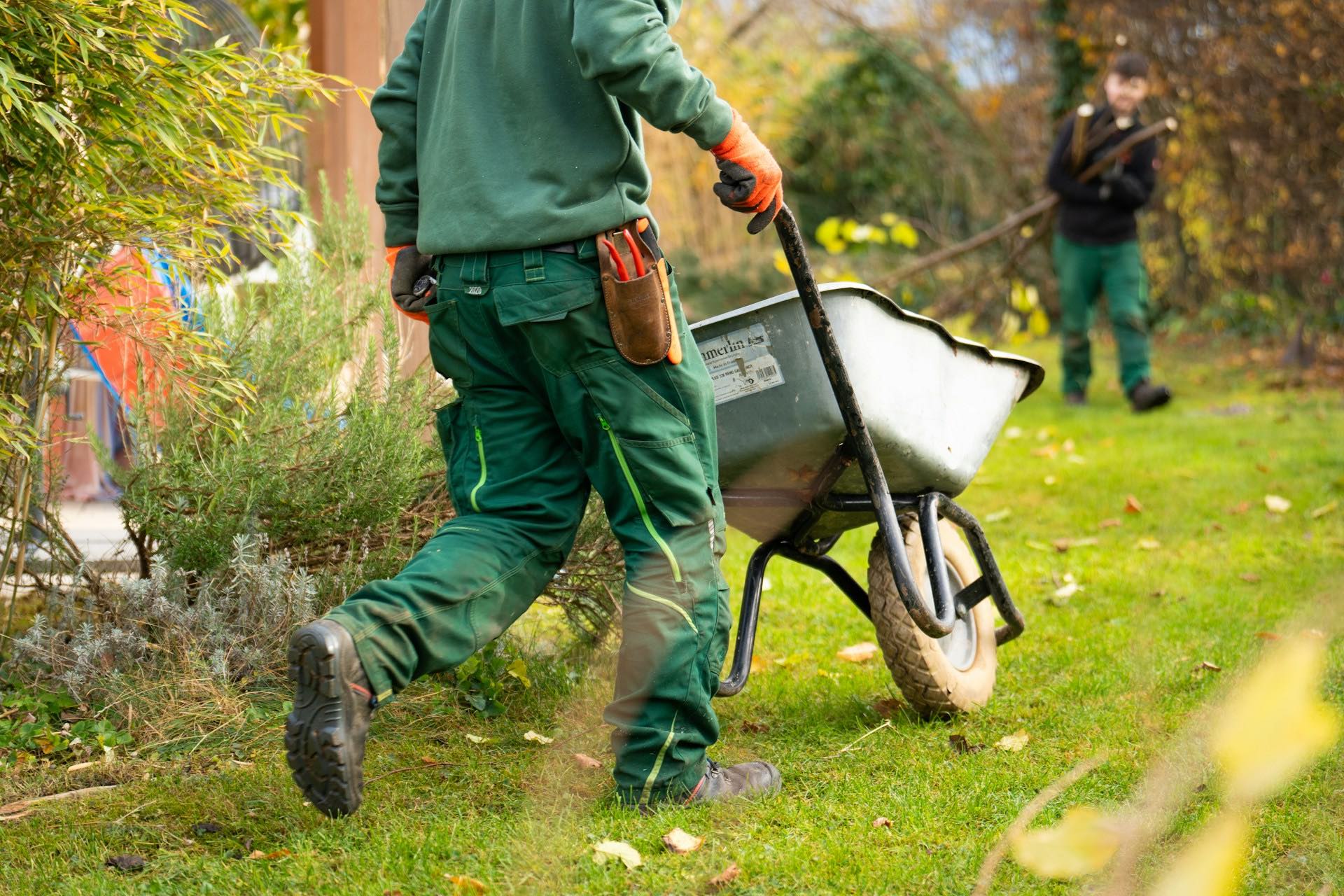 An image of landscapers working on a property.