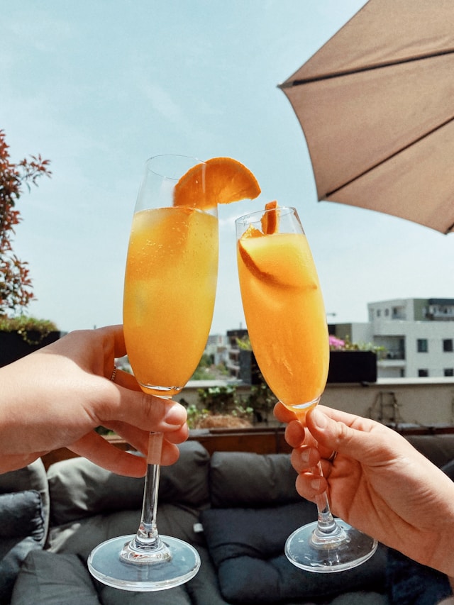 An image of two glasses of mimosas.
