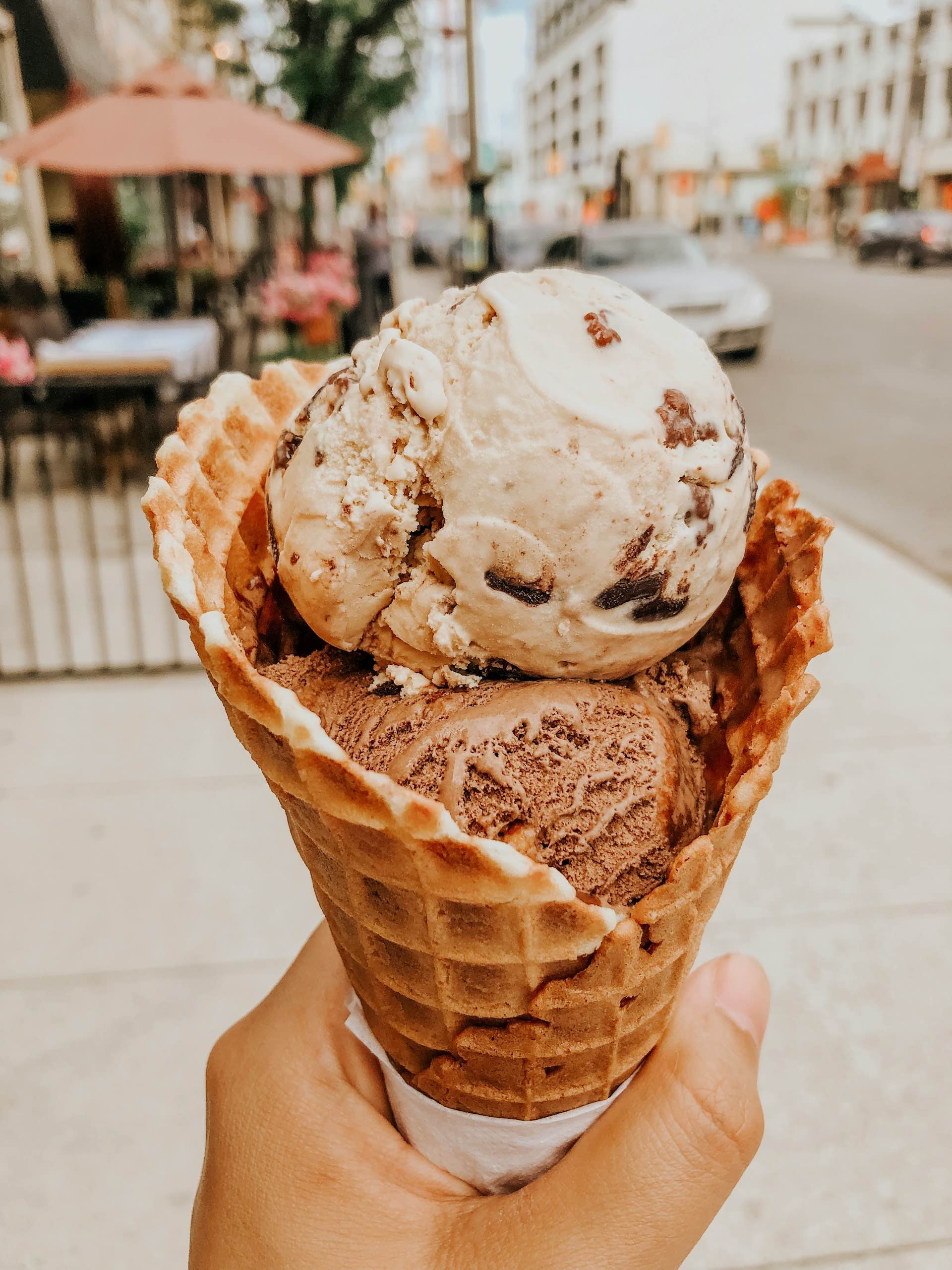 An image of someone holding an ice cream cone.