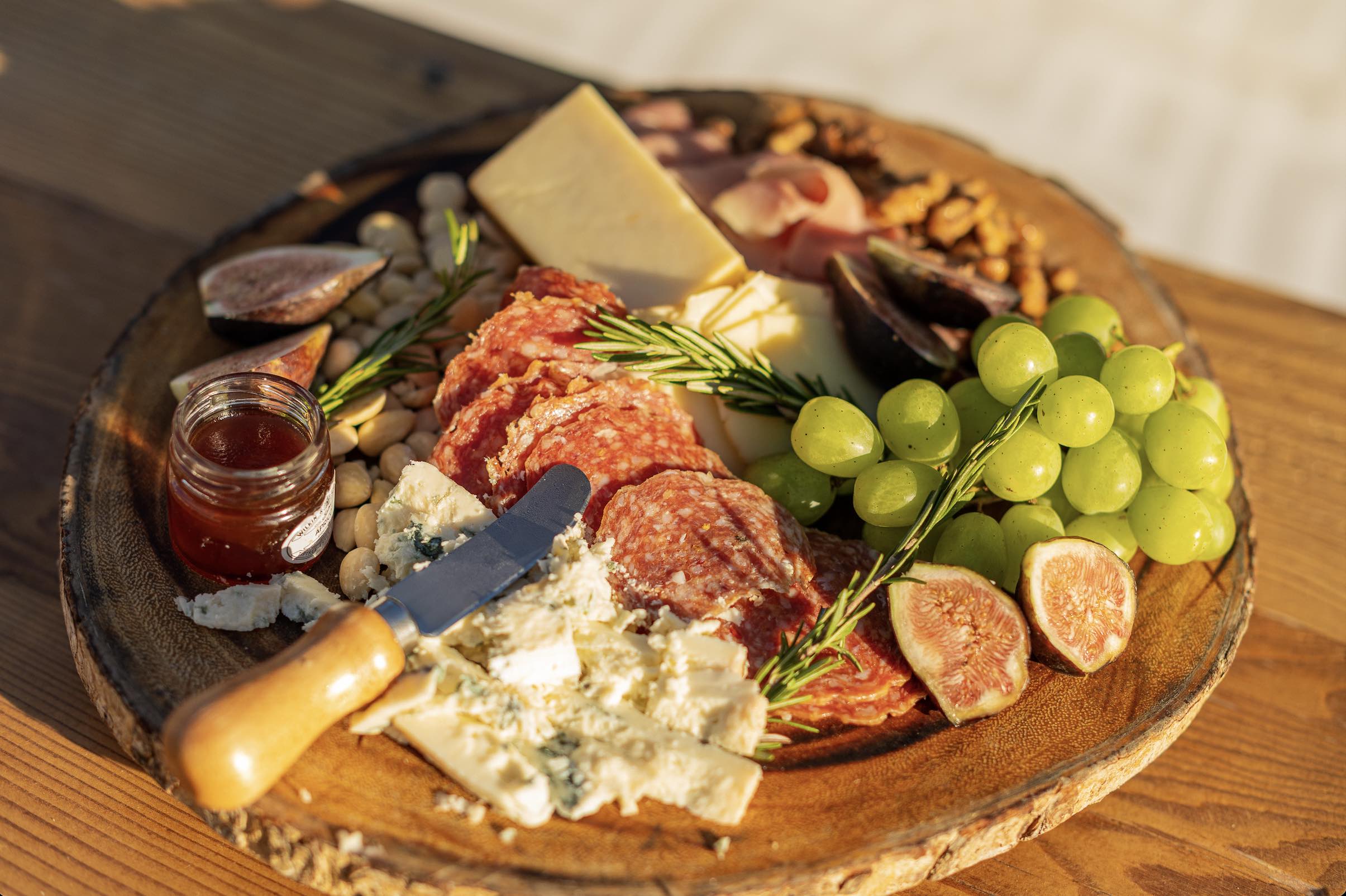 An image of the spread at Osa, the stunning new rooftop restaurant atop the brand-new AC Hotel Pasadena