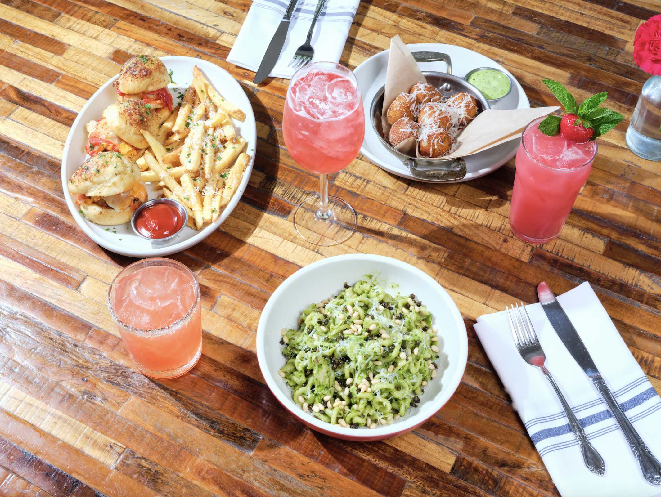 An image of the spread with three new cocktails from North Italia.