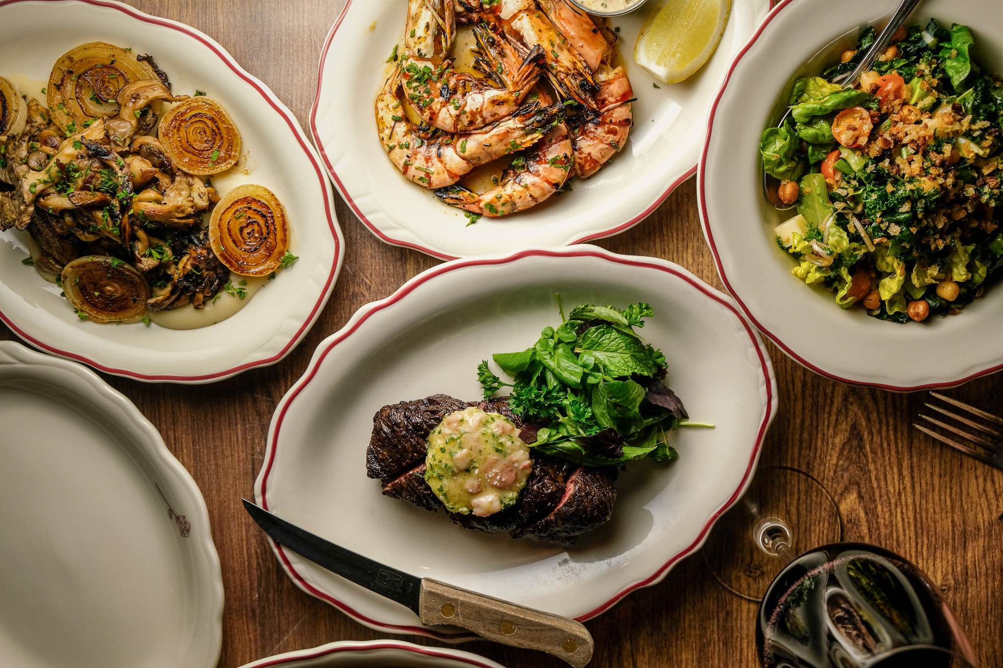 An image of the spread at one of the 5-course tasting menus at American Beauty.