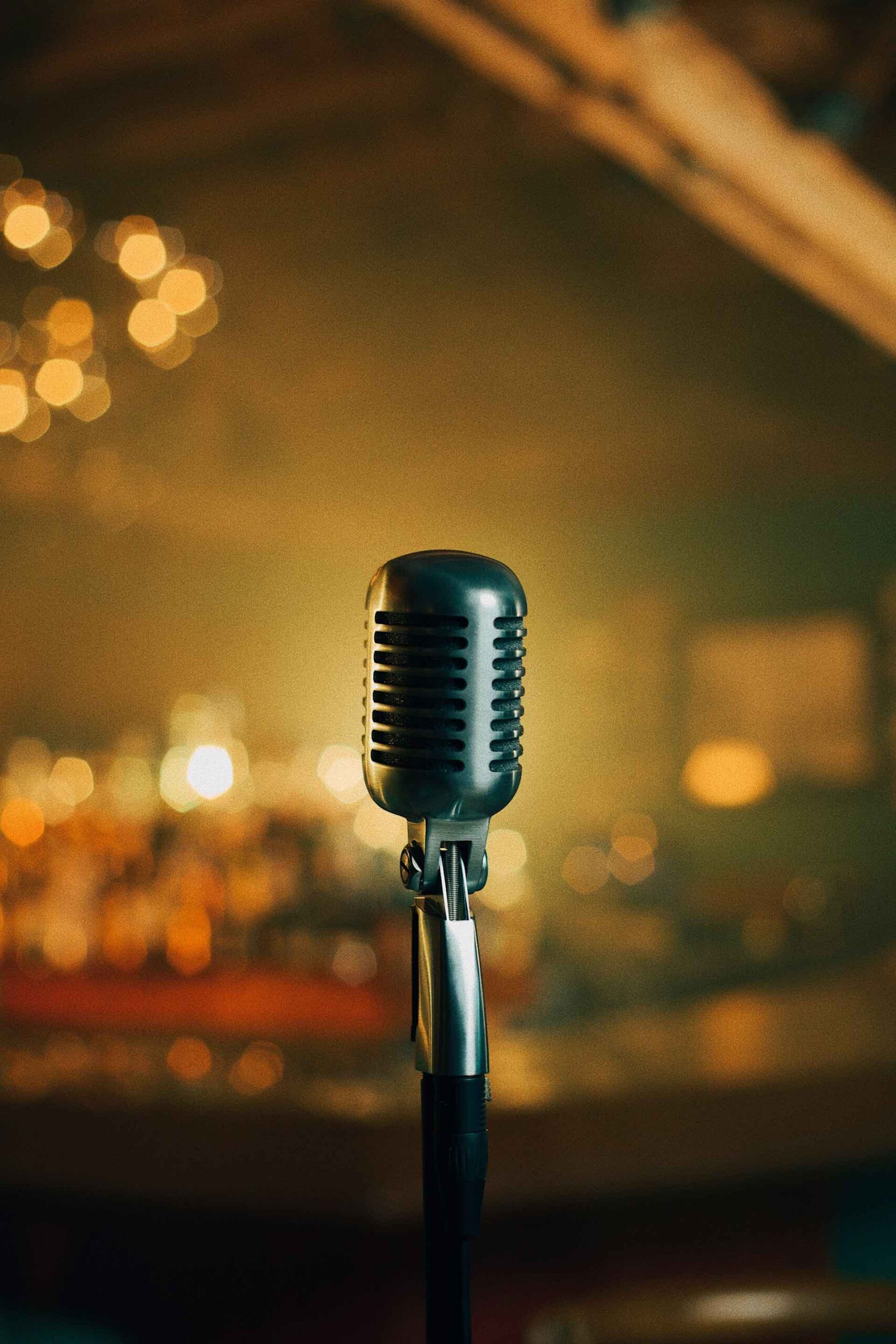 An image of a microphone on a stage.