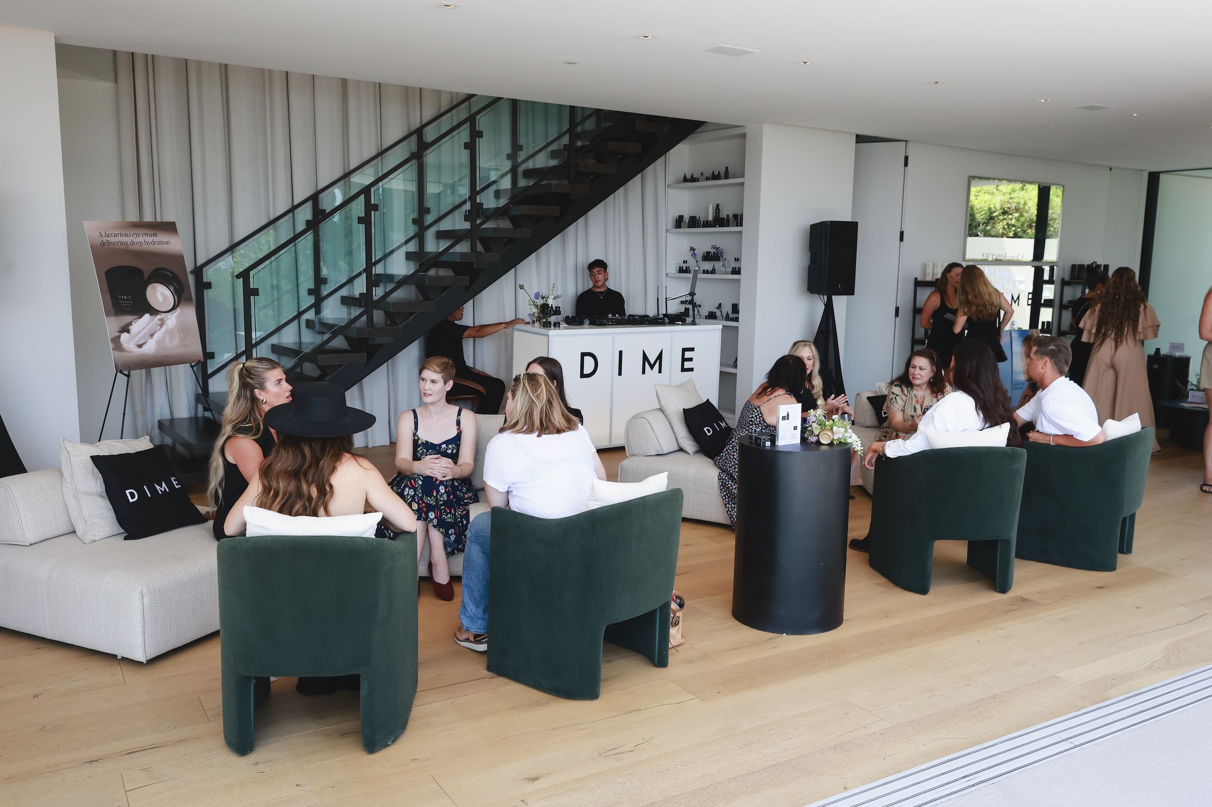 An image of guests networking at the DIME beauty TBT Eye Cream launch.