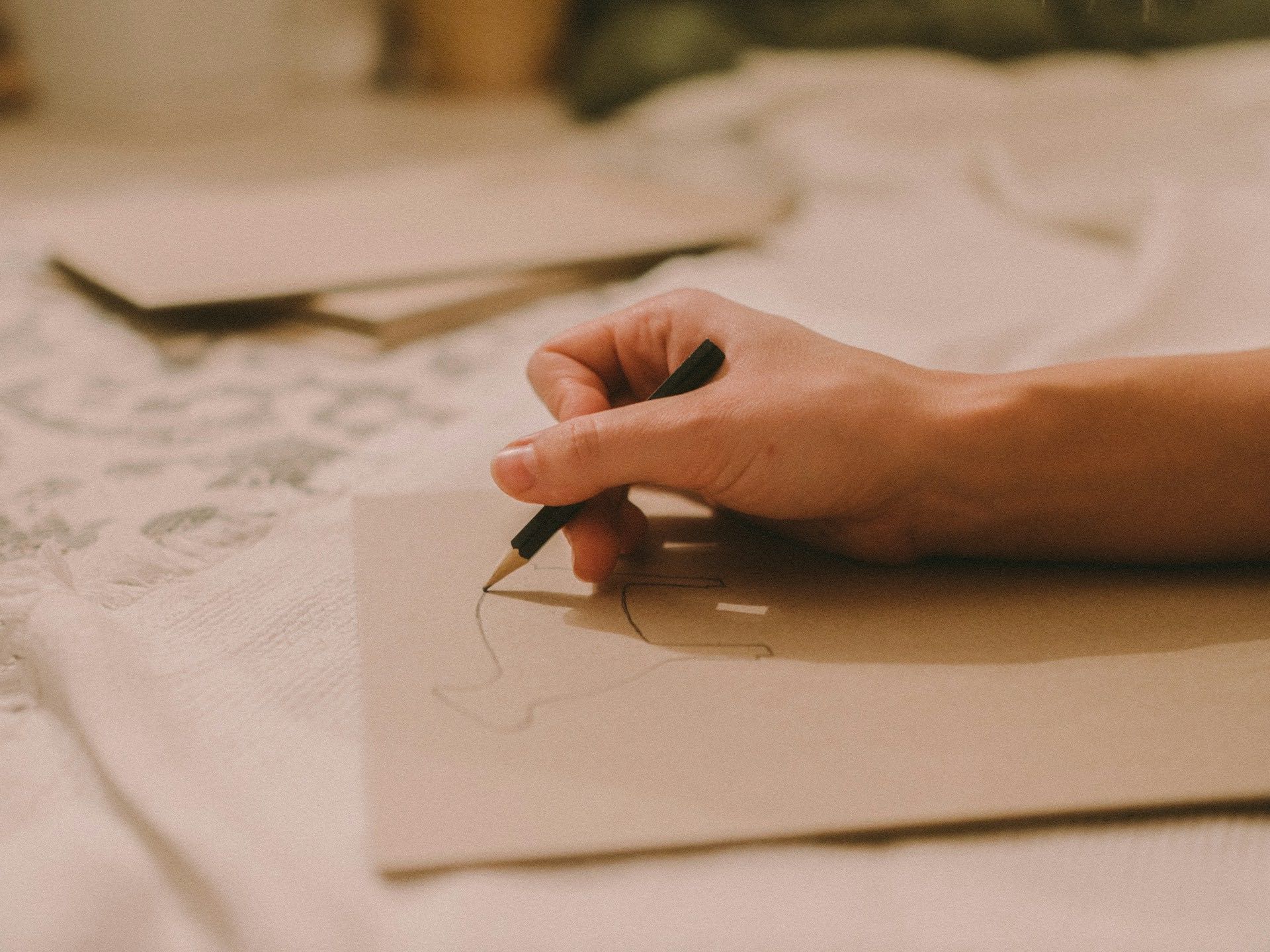 An image of someone drawing.