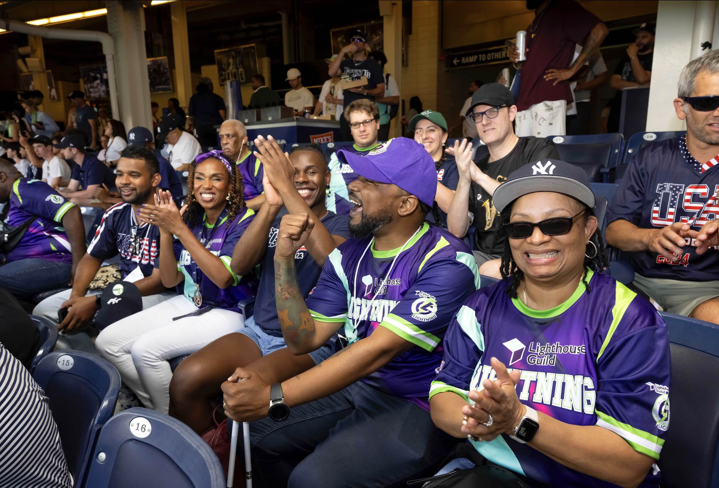 An image of Lighthouse Guild’s blind baseball team, The Lighthouse Guild Lightning at a New York Yankees game celebrating the 35th Anniversary Of Americans with Disabilities Act (ADA) 