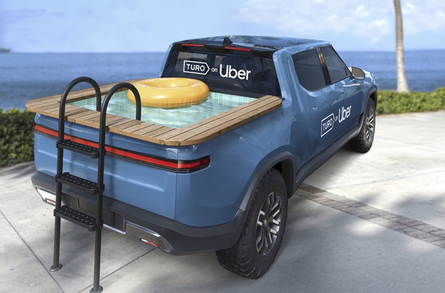 An image of a Truck with a pool in the back.