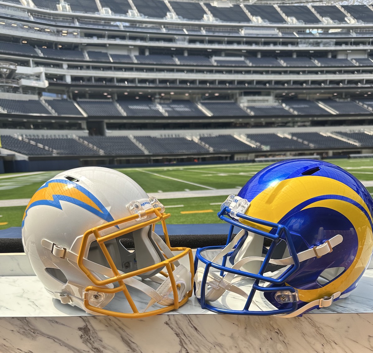 An image of the LA Rams and LA Chargers helmets.