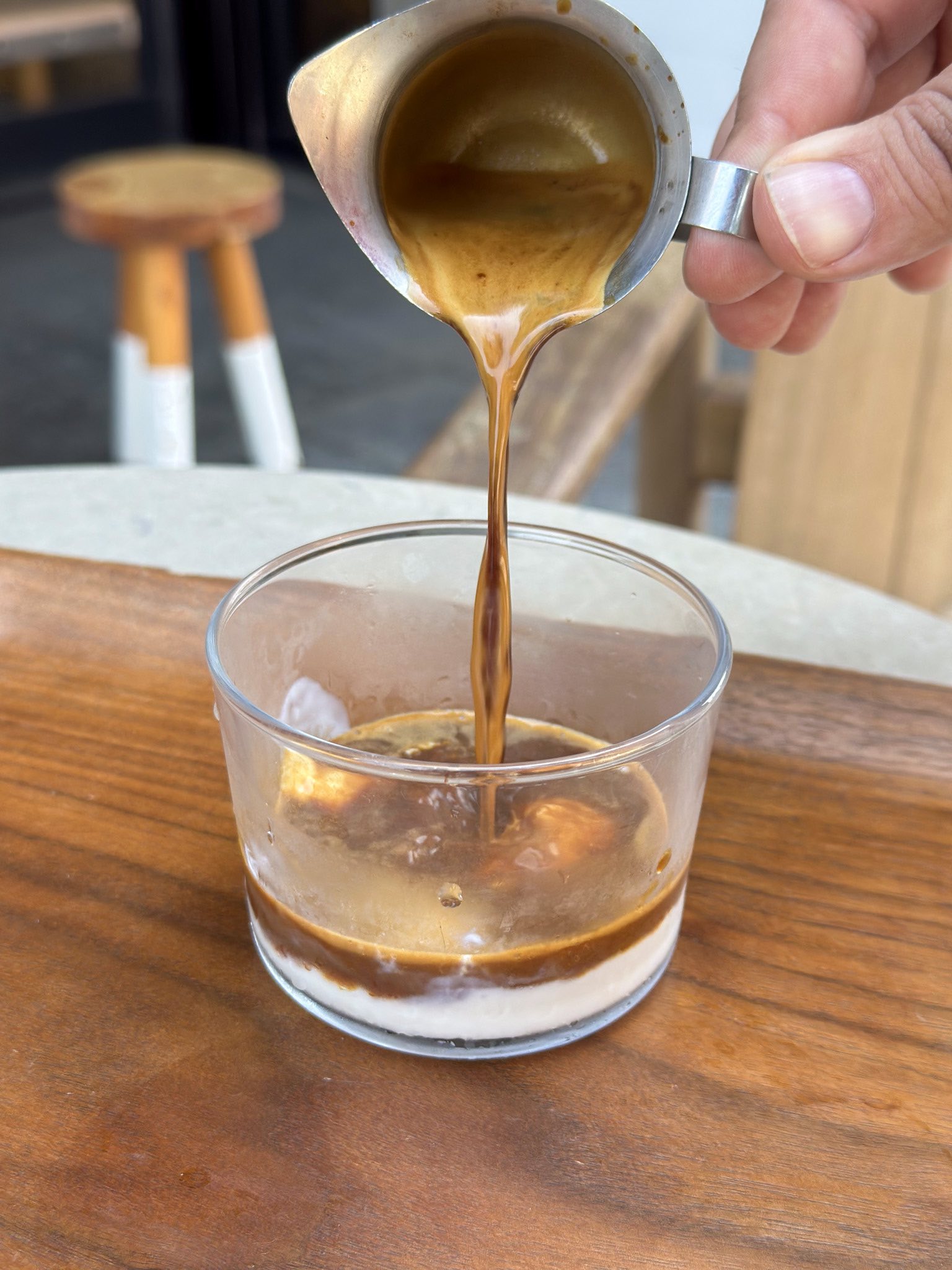 An image of the Boxx Affogato: A reimagined affogato made with egg- and sugar-free house-made ice cream, topped with competition-series espresso. 