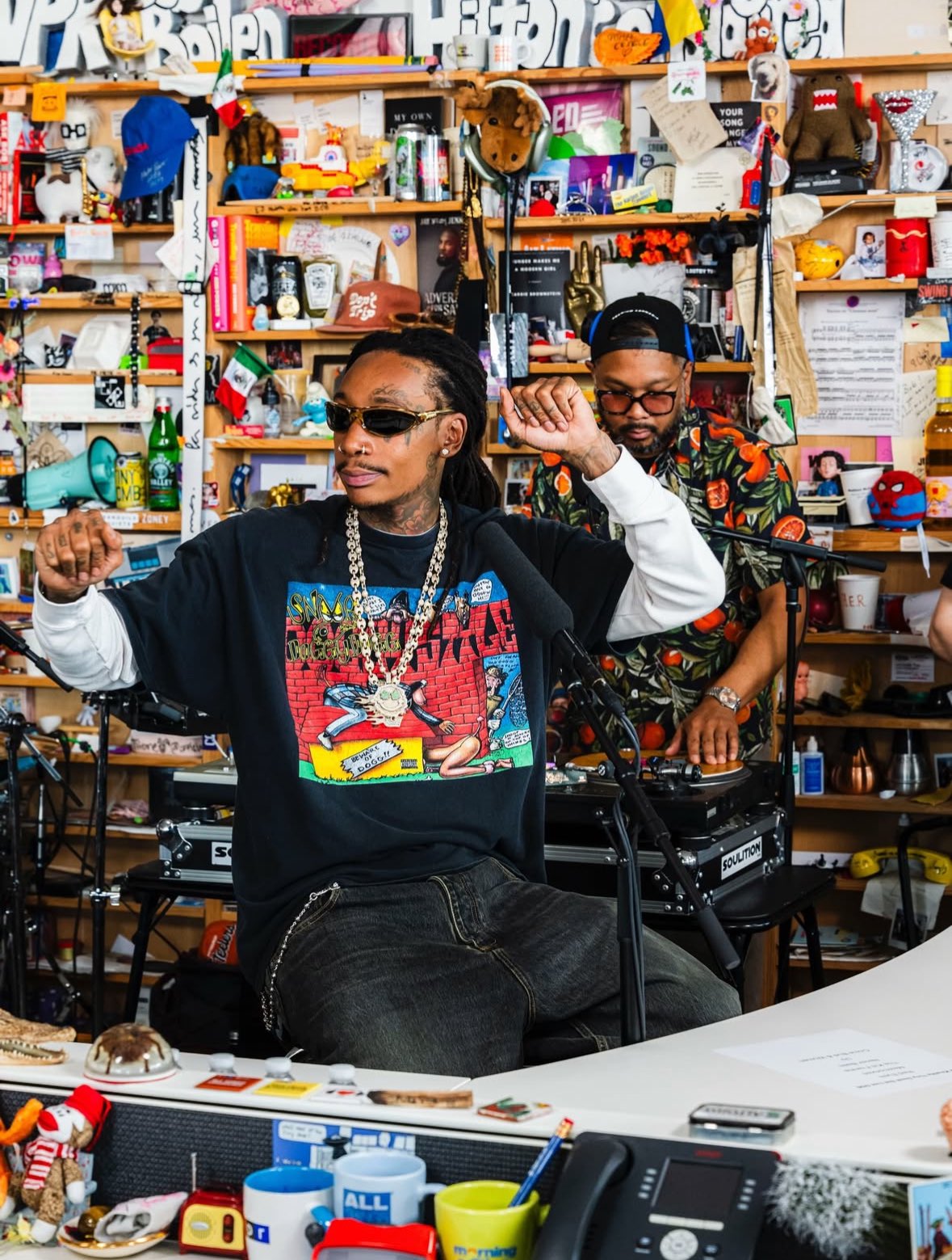 An image of rapper Wiz Khalif and his DJ, DJ Bonics.