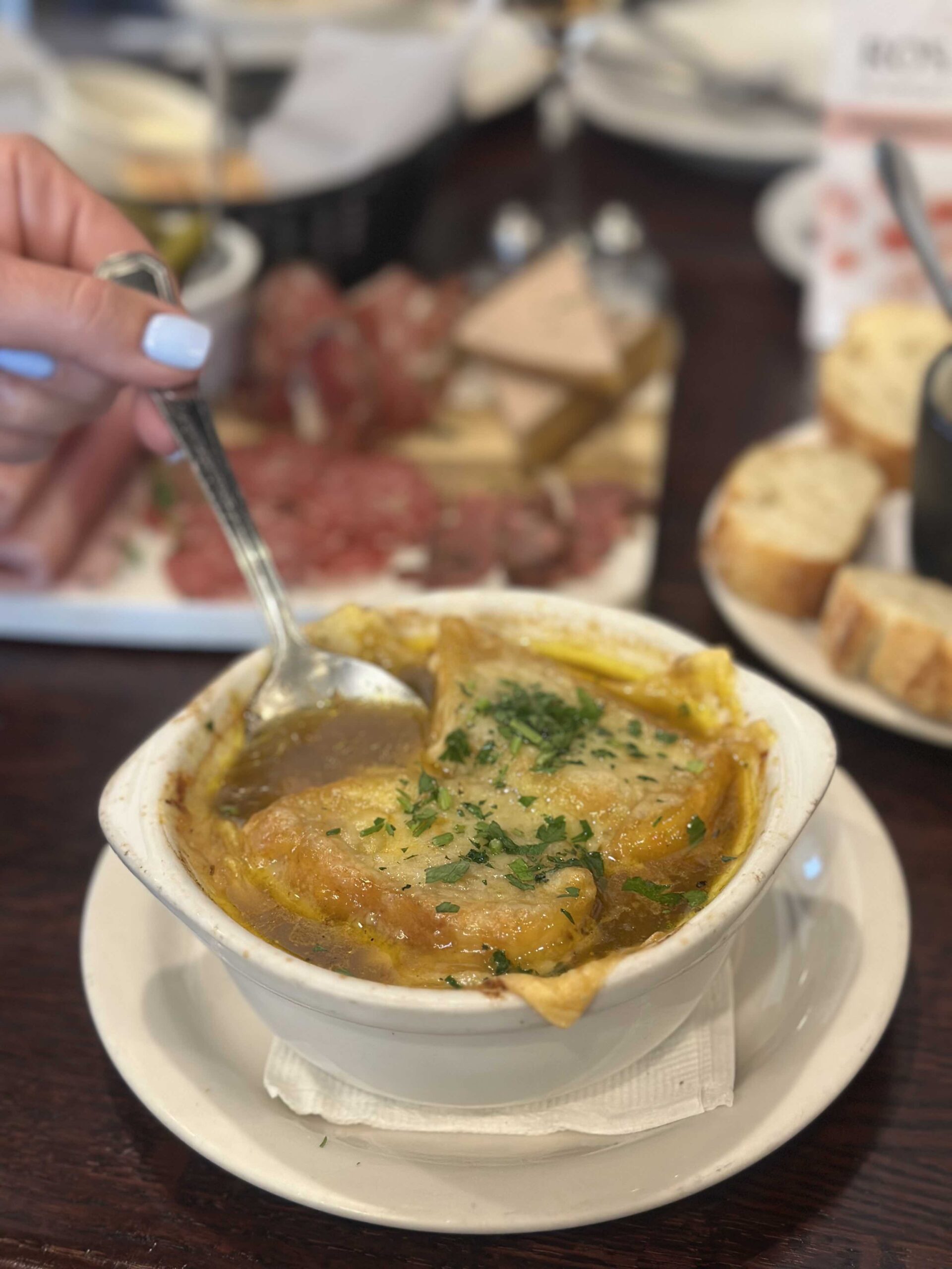 An image of a bowl of French Onion Soup.