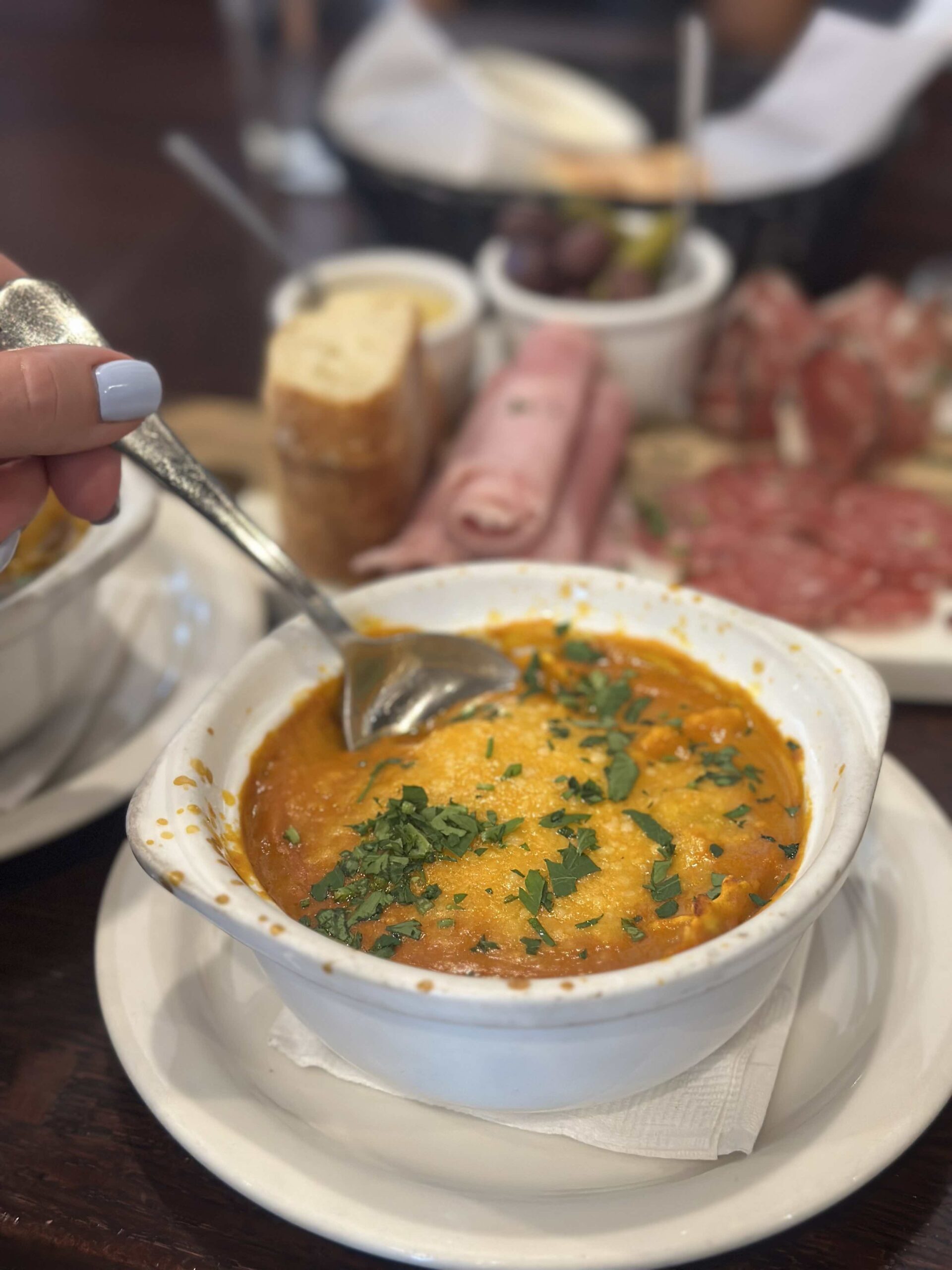 An image of a bowl of Ravioletti with prawns.
