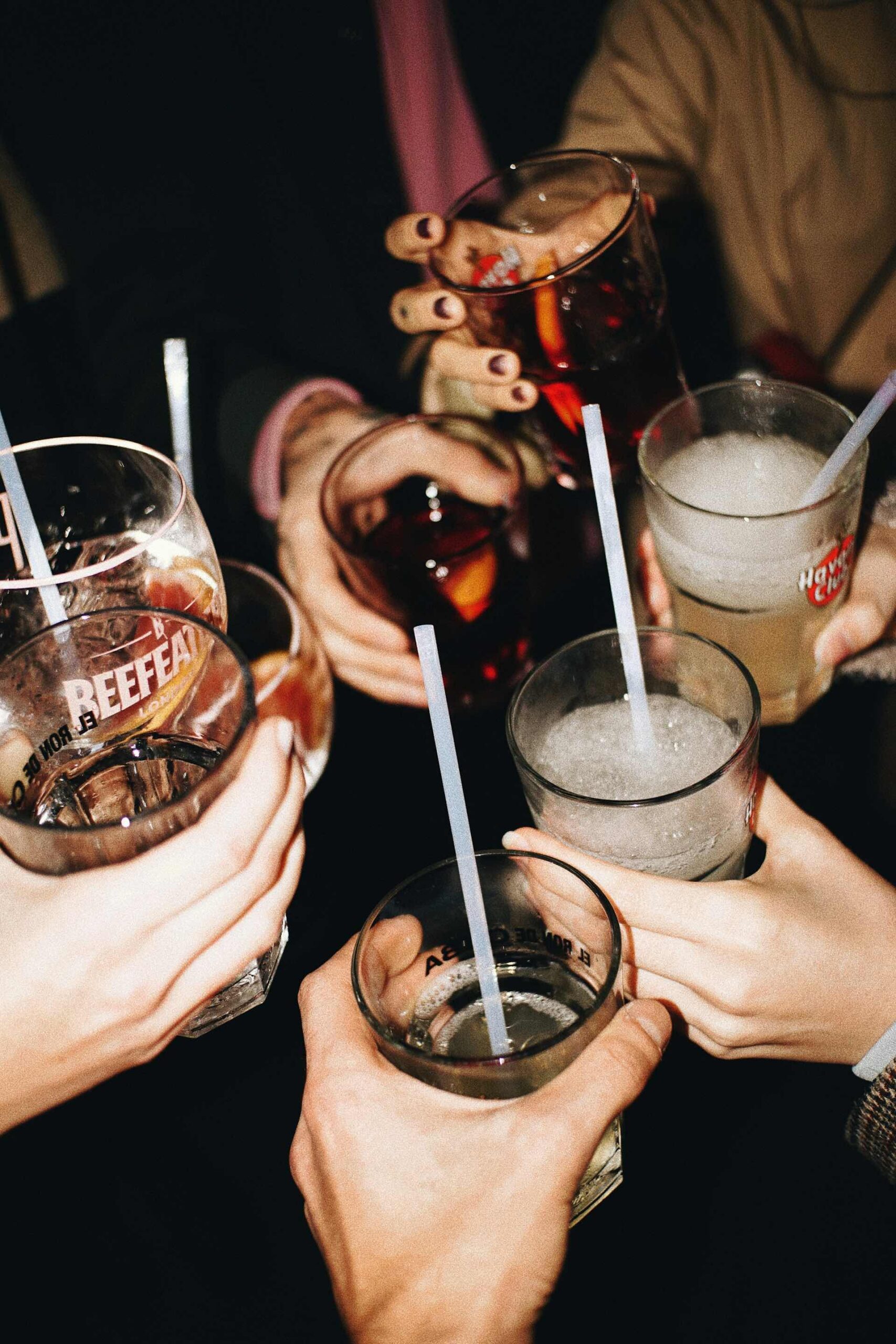 An image of a group of people holding drinks.