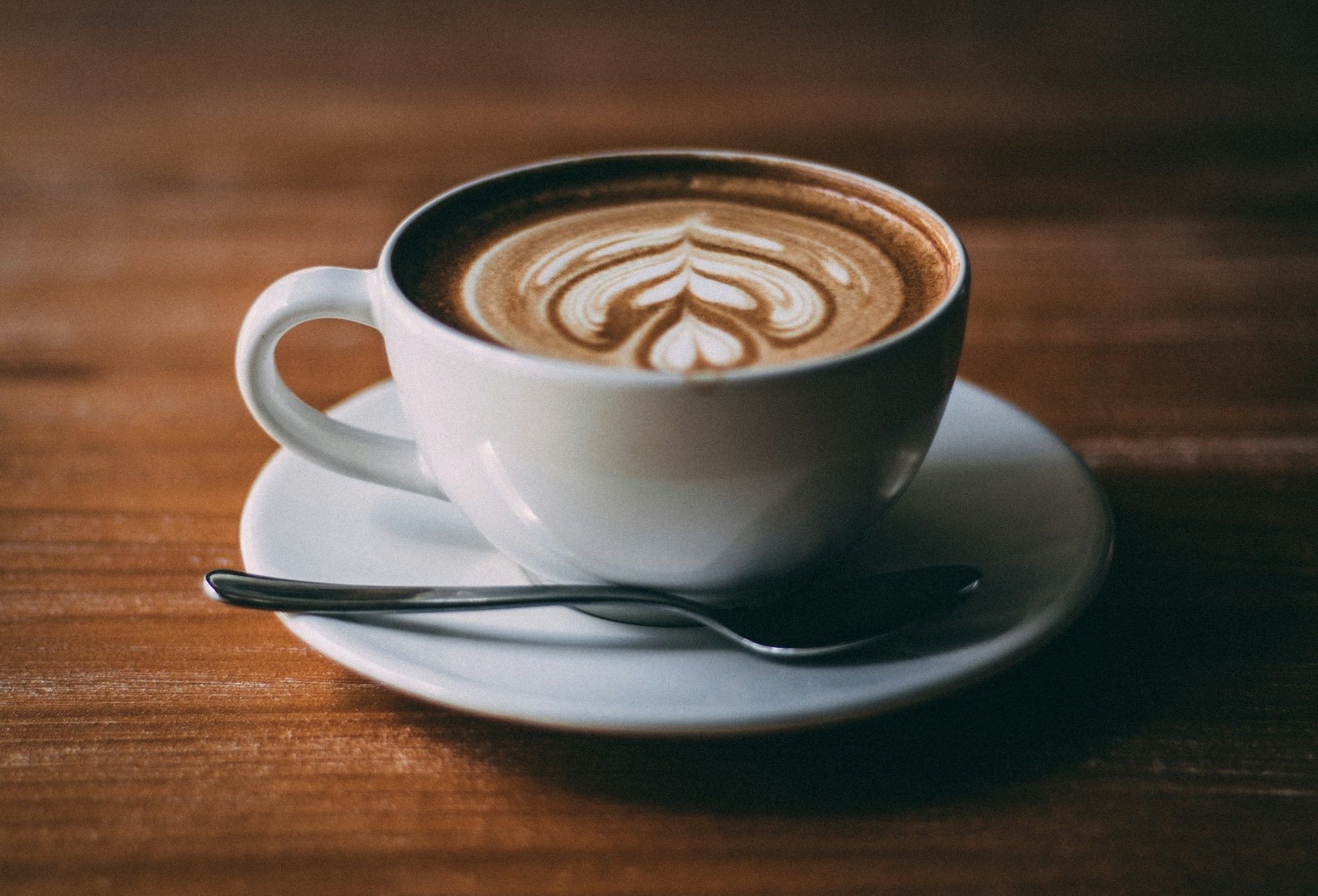 An image of a cup of coffee with a decoration.