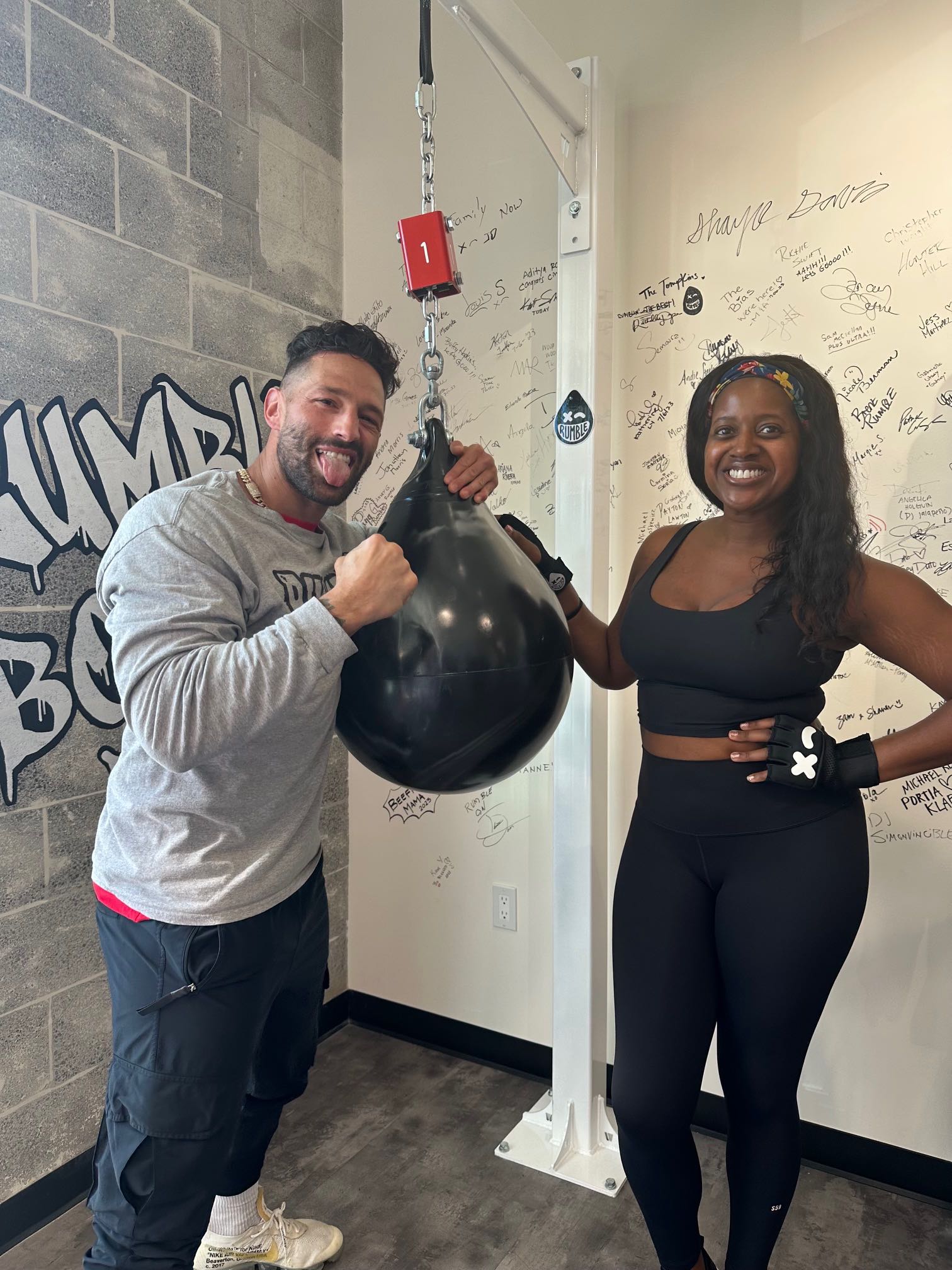 An image of lifestyle blogger Ariel and Rumble Boxing creator Noah Neiman.