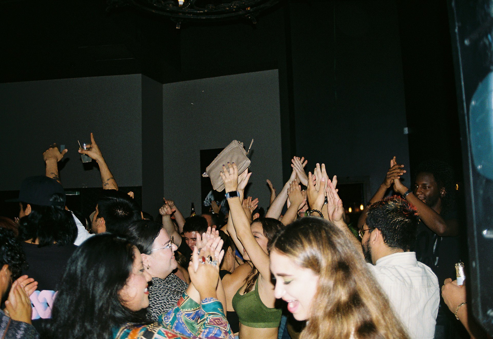 An image of people dancing at a party.