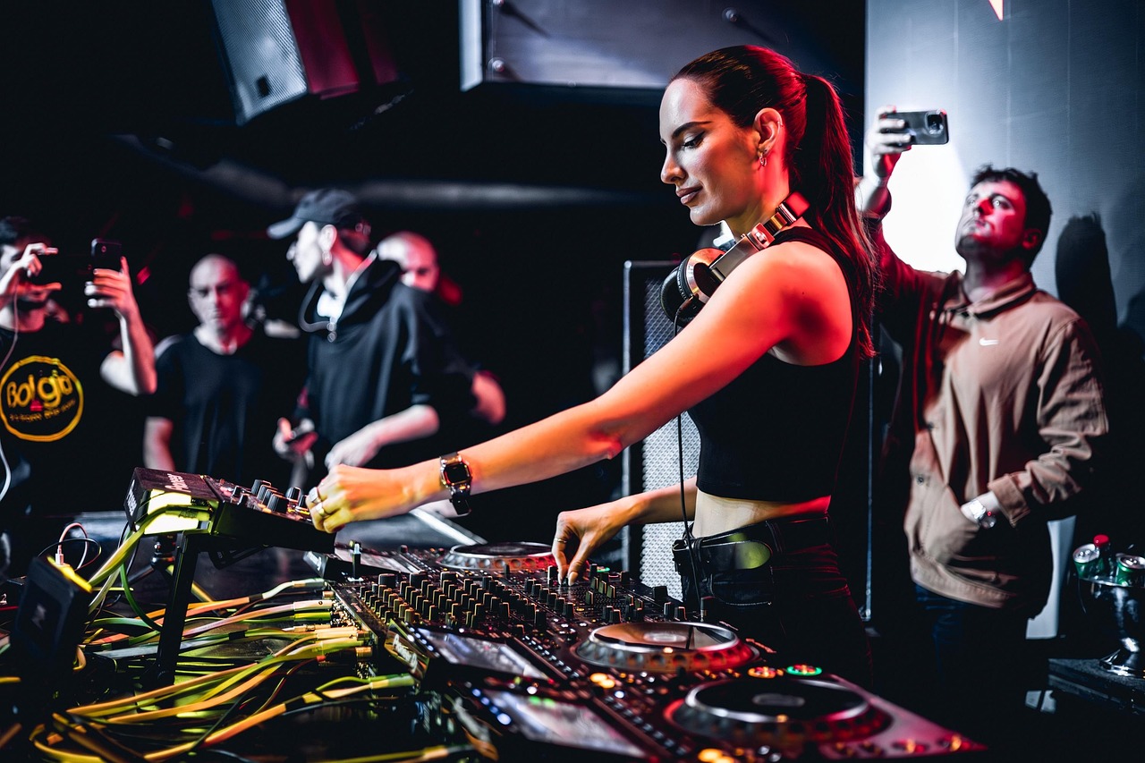 An image of a female DJ entertaining the crowd.