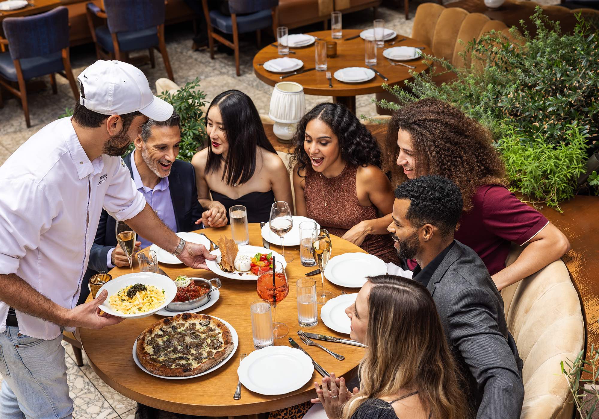 An image of a group of people eating at a West Hollywood restaurant.