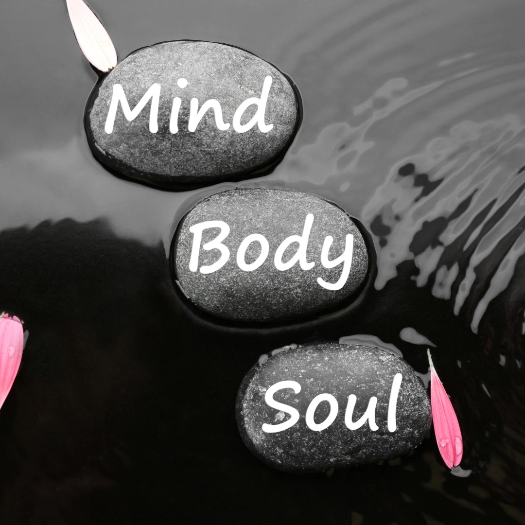 An image of three rocks that say Mind, Body, and Soul