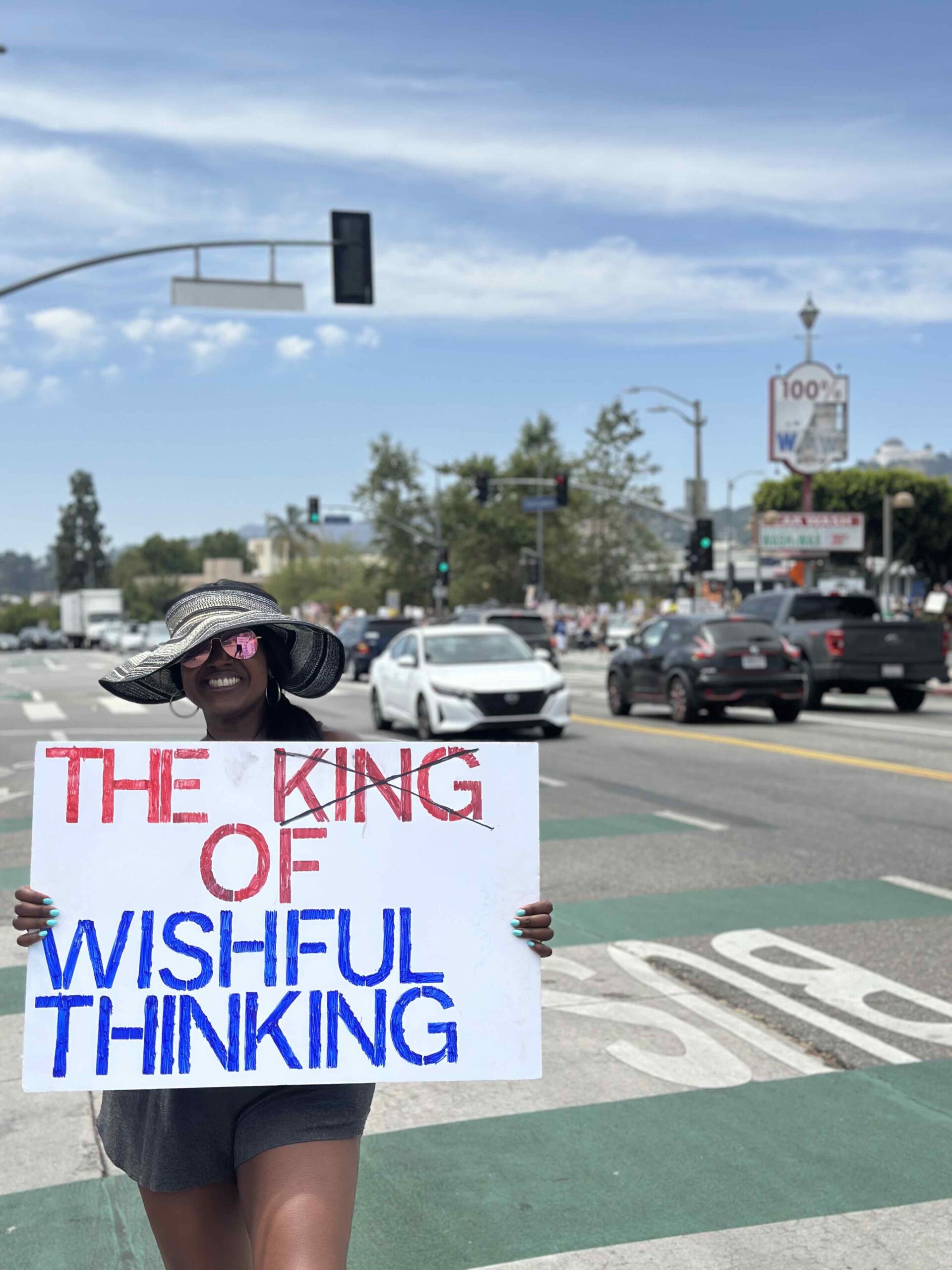 An image of lifestyle blogger Ariel Johns at the No Kings Protest.