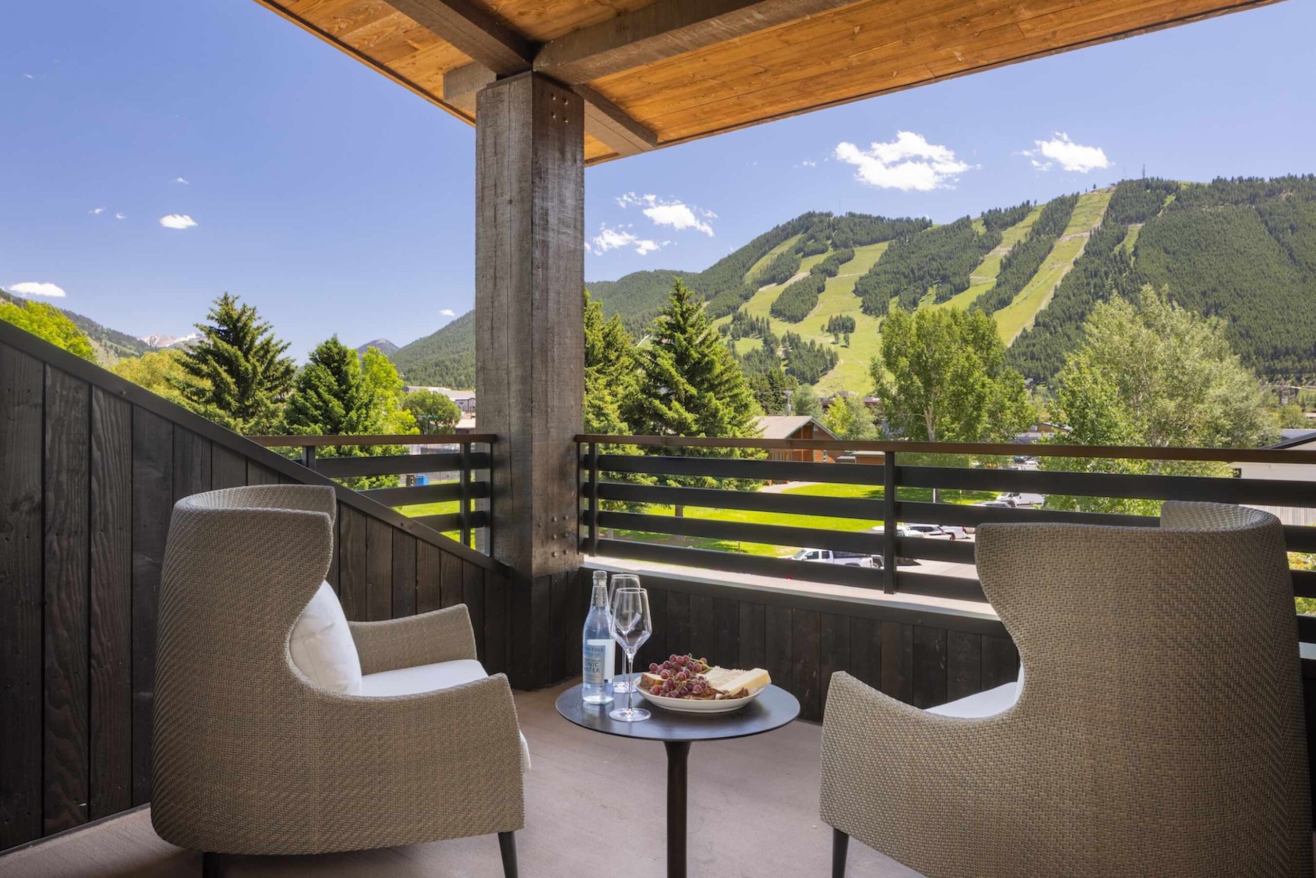 An image of the balcony and hills of The Rusty Parrot Lodge & Spa.