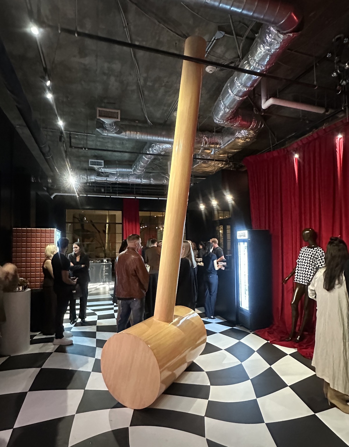 An image of the larger-than-life branded mallet centerpiece.