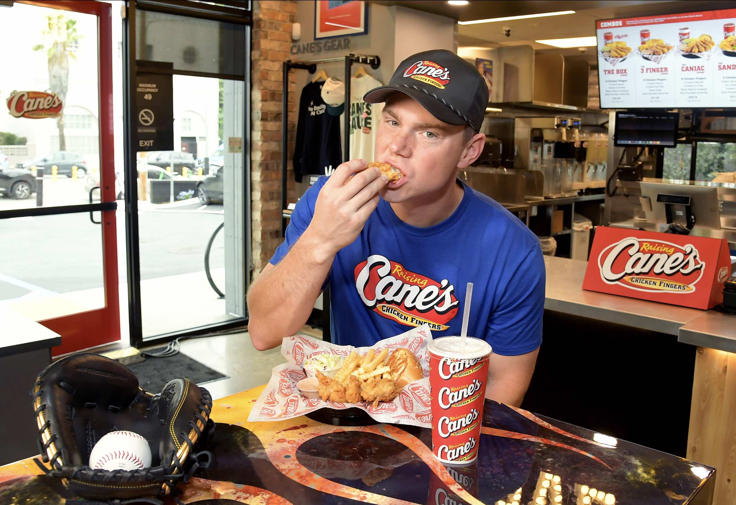 An image of Dodgers Will Smith eating Raising Cane's chicken.