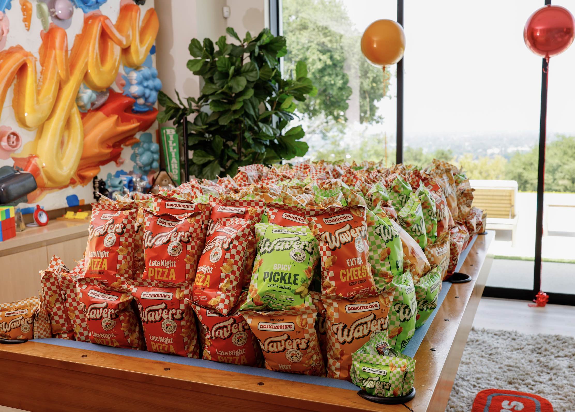 An image of the 4 flavors of Wavers snacks: Late Night Pizza, Spicy Pickle, Extra Cheesy, and Hot Honey.