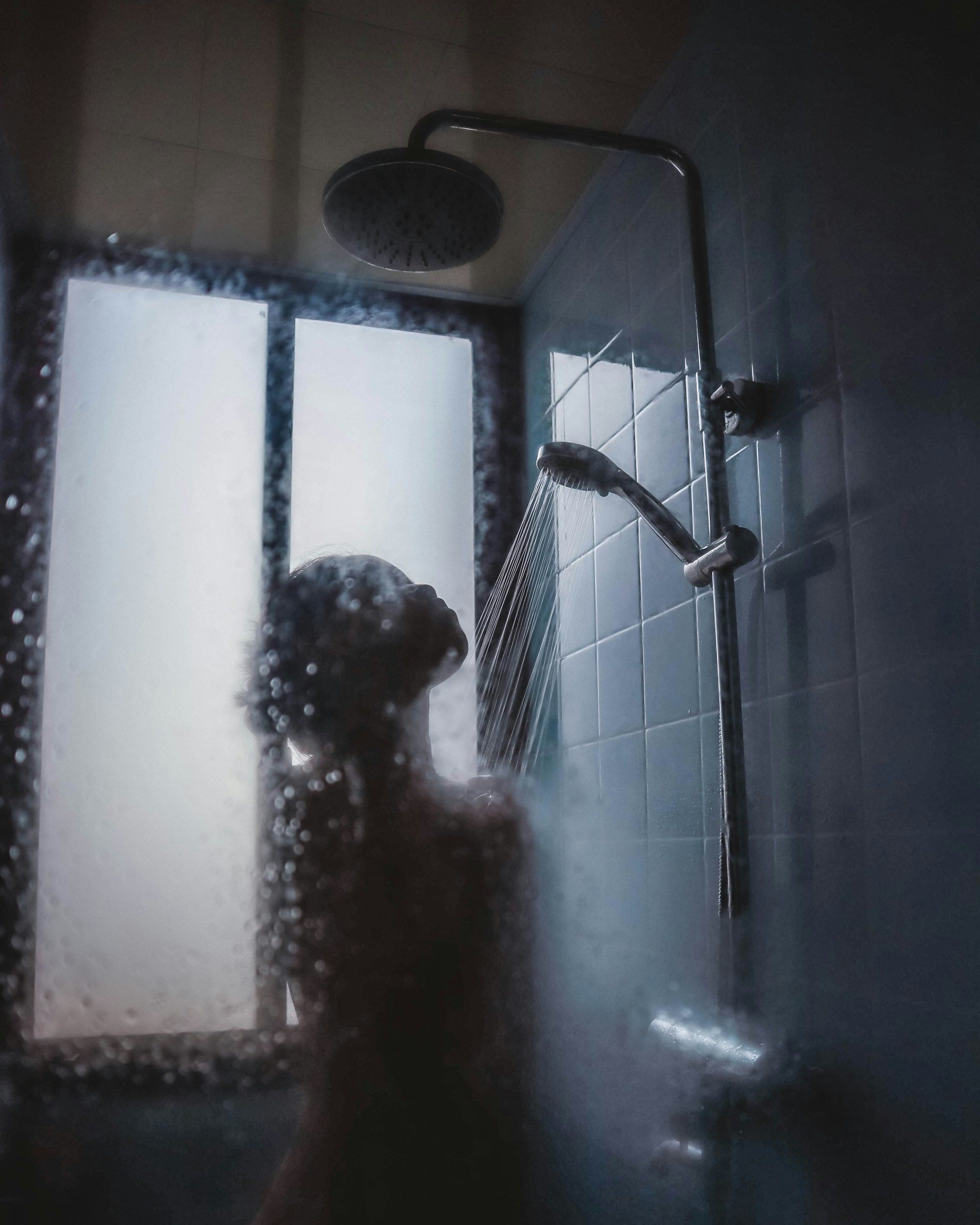 An image of someone taking a hot shower.
