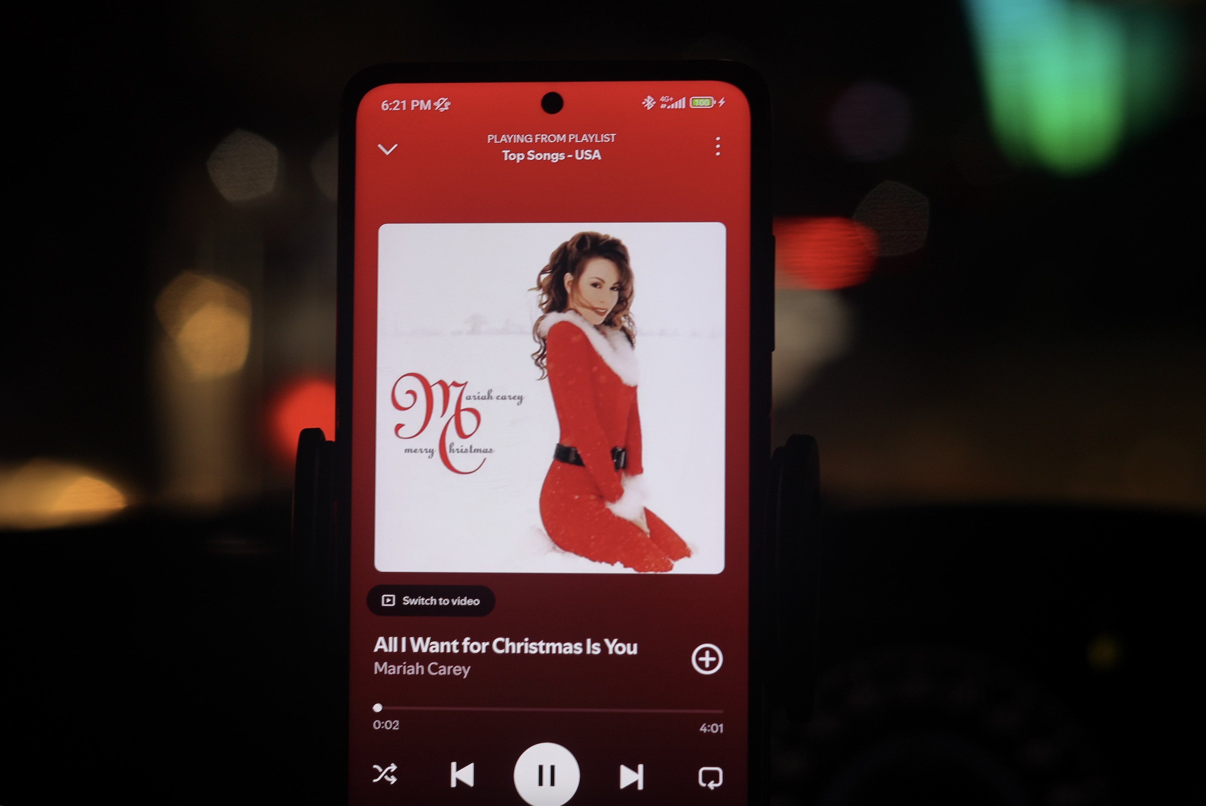 An image of Mariah Carey's All I want for Christmas on a cellphone.
