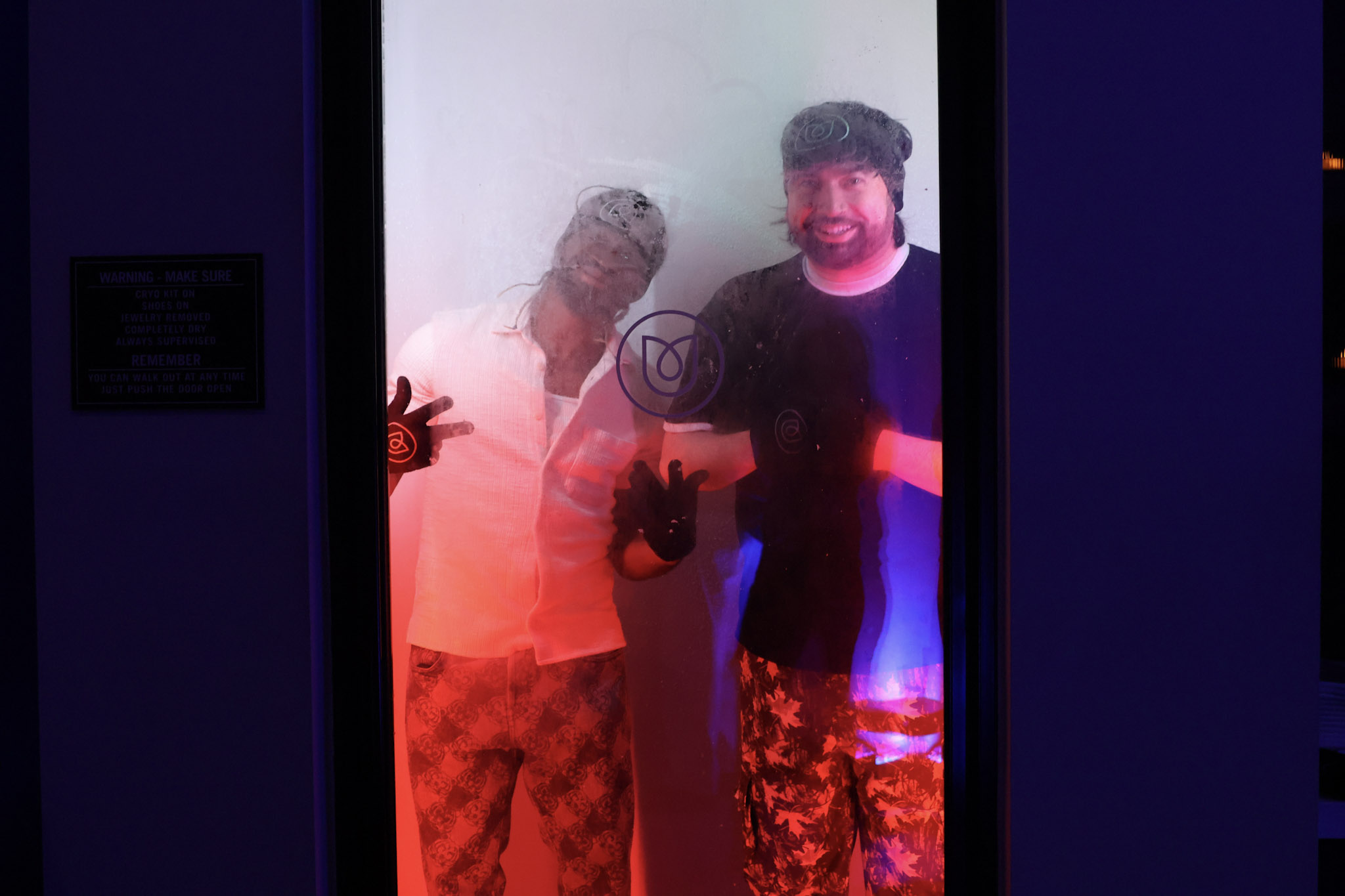 An image of two guests in a Cryotherapy chamber.