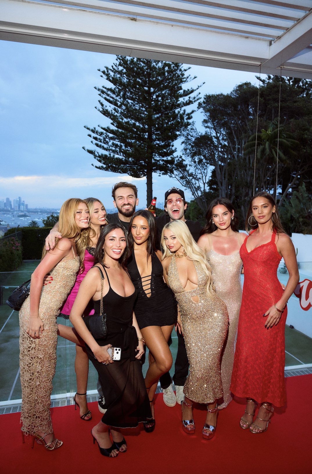 An image of Content creators, and friends of David Dobrik and influencer/fashion designer Emma Pills, celebrate the New Year at her home in Sydney, Australia.