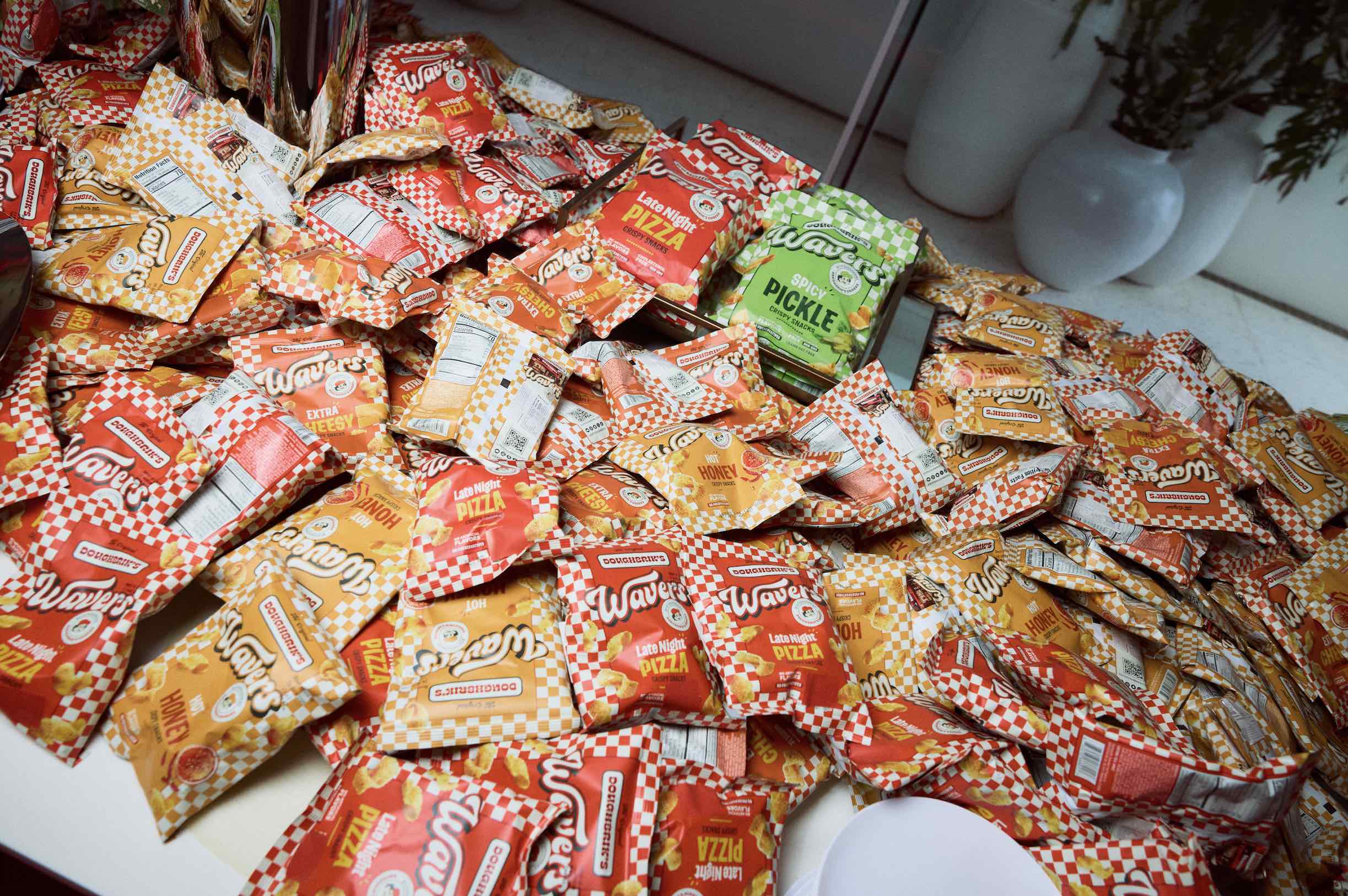 An image of bags of Wavers snacks.
