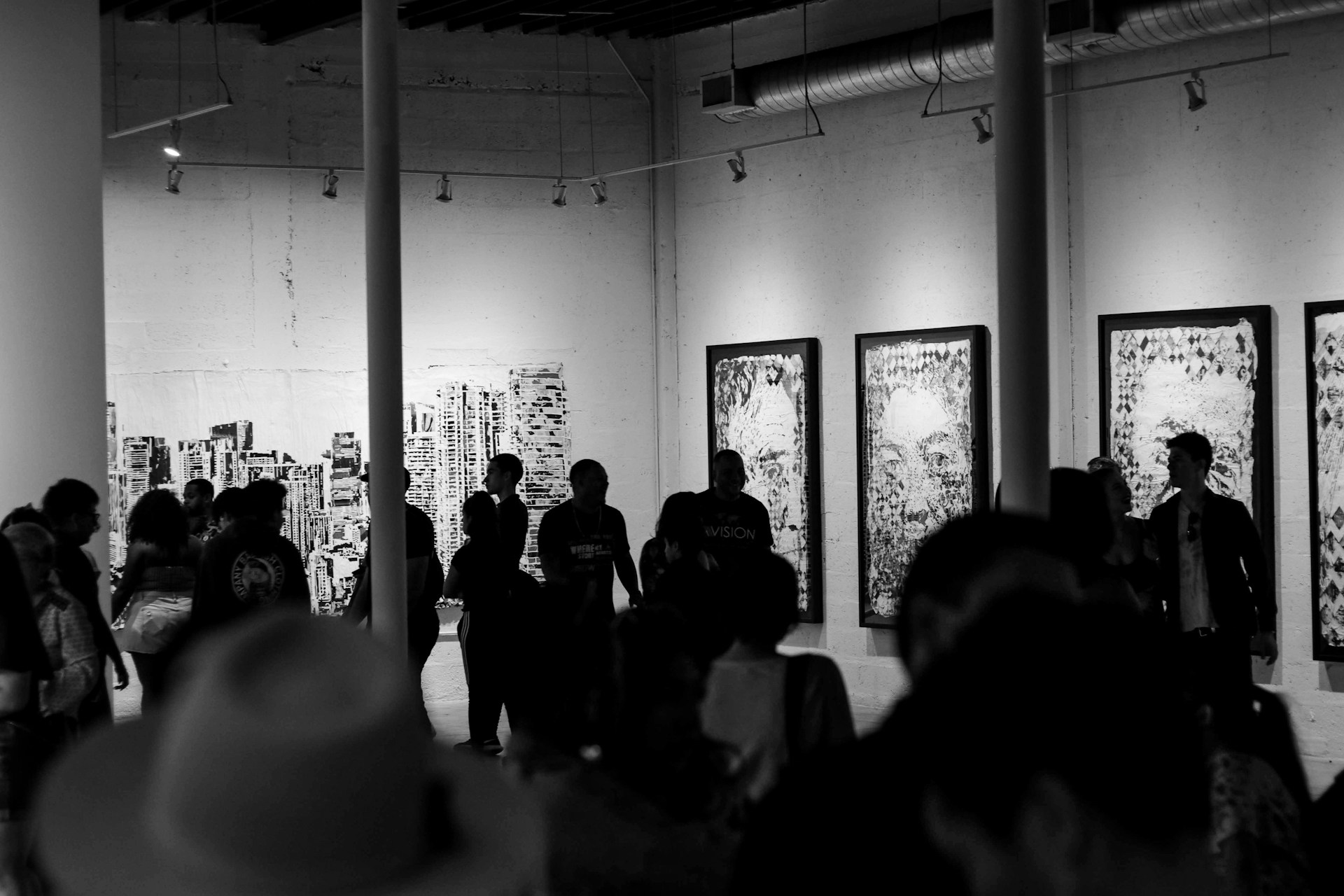 An image of people at an art gallery.
